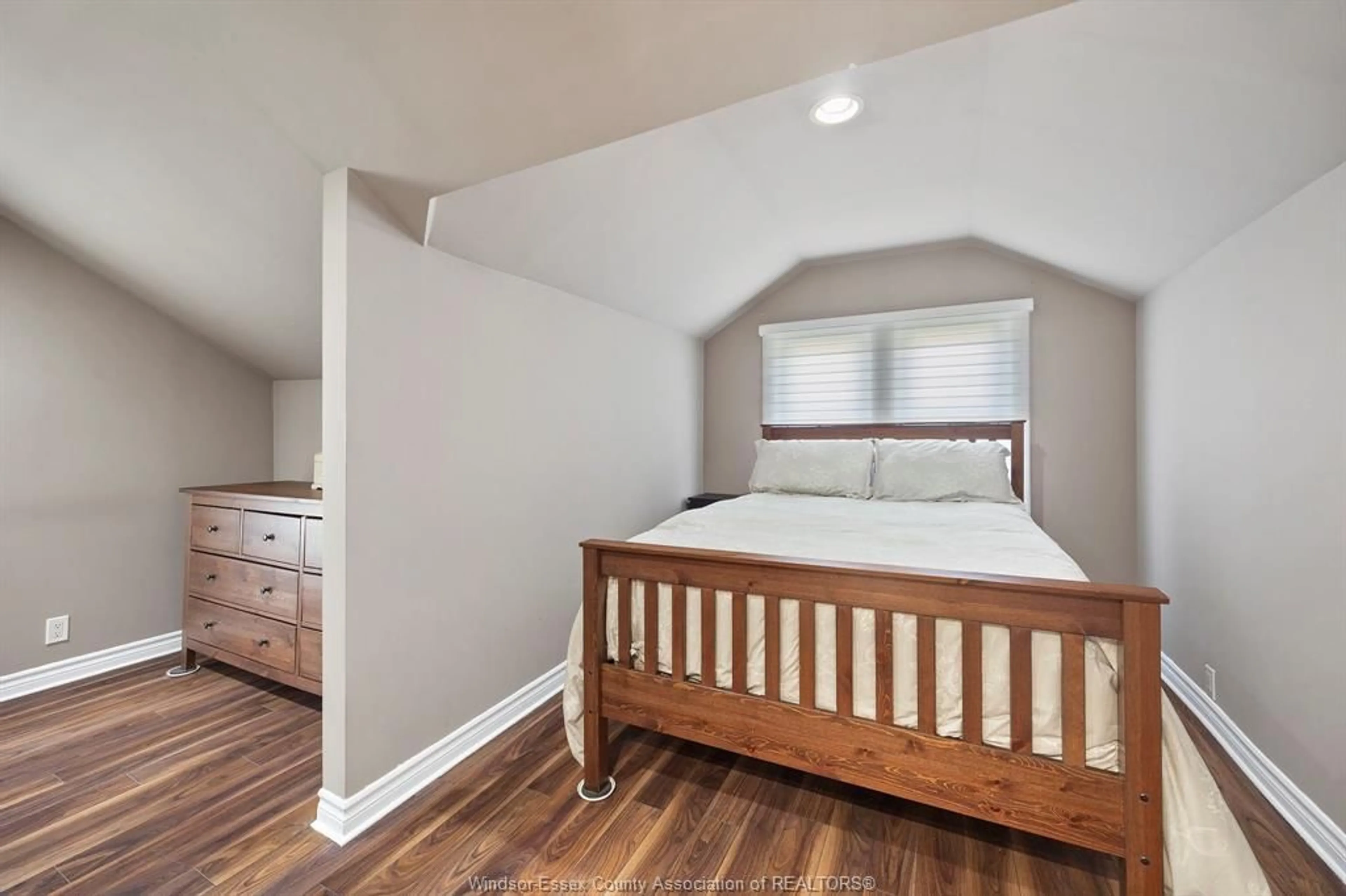 Bedroom with bed, wood/laminate floor for 933 HANNA St, Windsor Ontario N8X 2P2