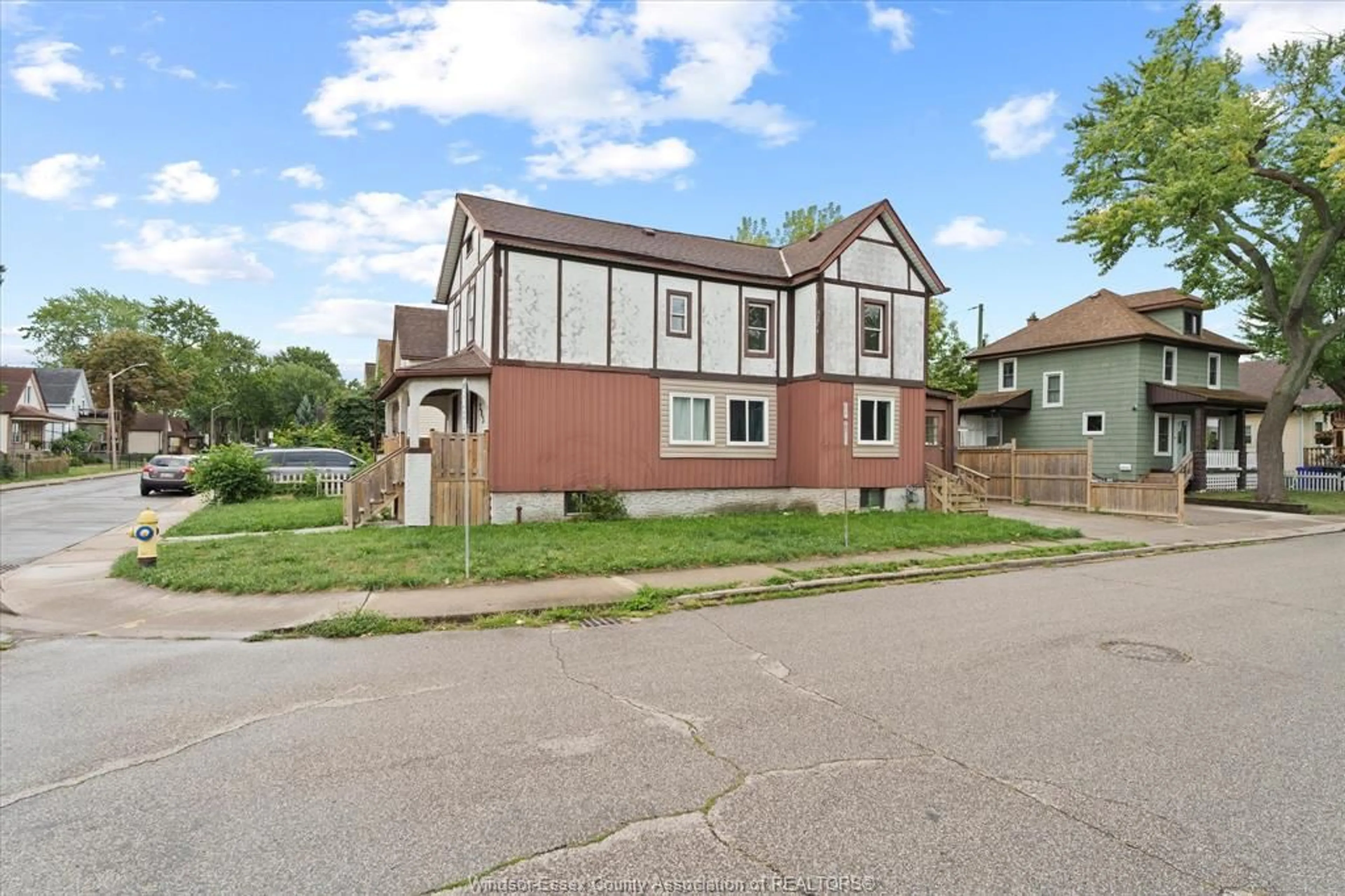 Home with brick exterior material, street for 205 PARENT Ave, Windsor Ontario N9A 2B5