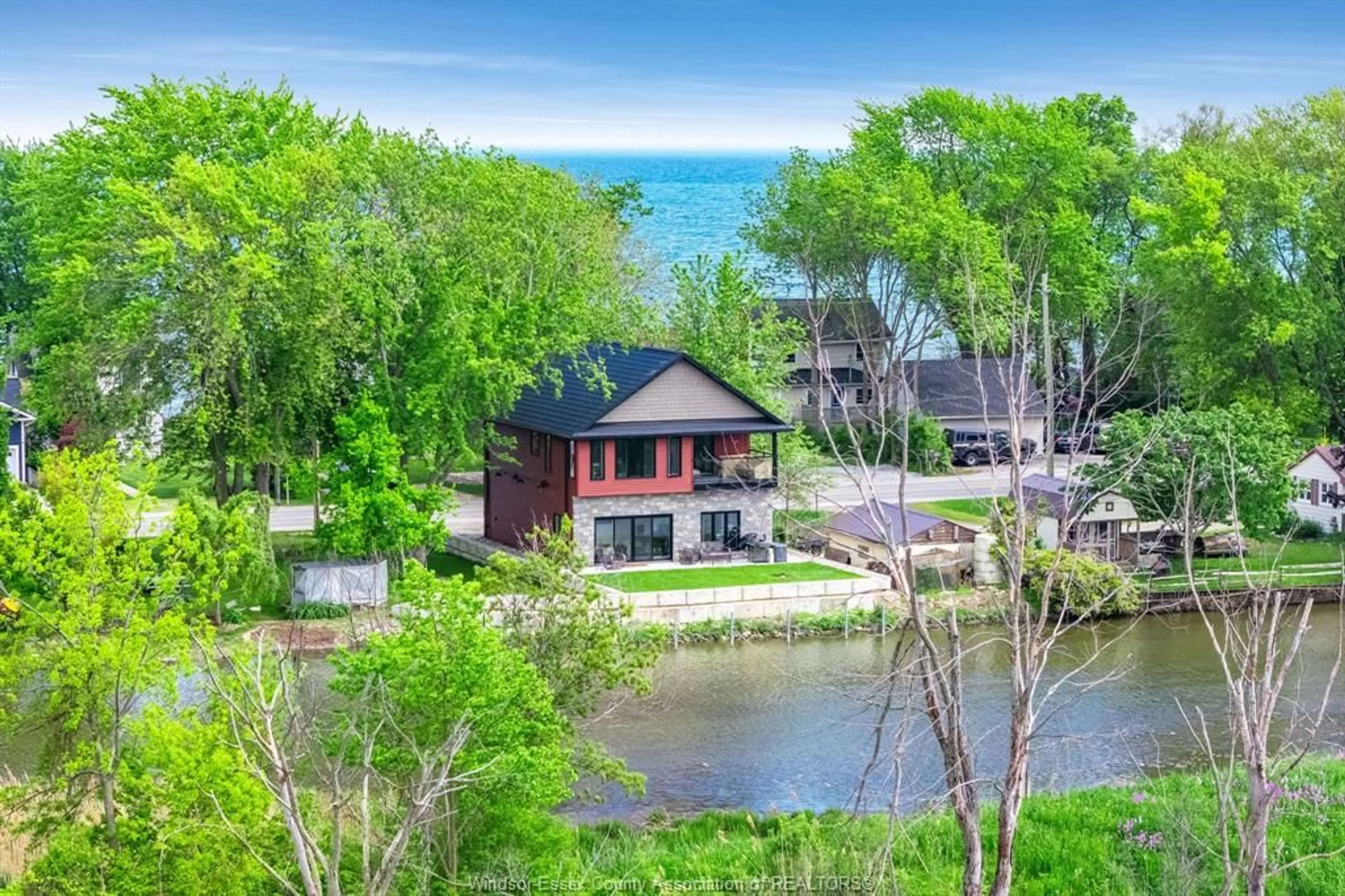 A pic from outside/outdoor area/front of a property/back of a property/a pic from drone, water/lake/river/ocean view for 1260 Heritage Rd, Kingsville Ontario N9Y 2E6