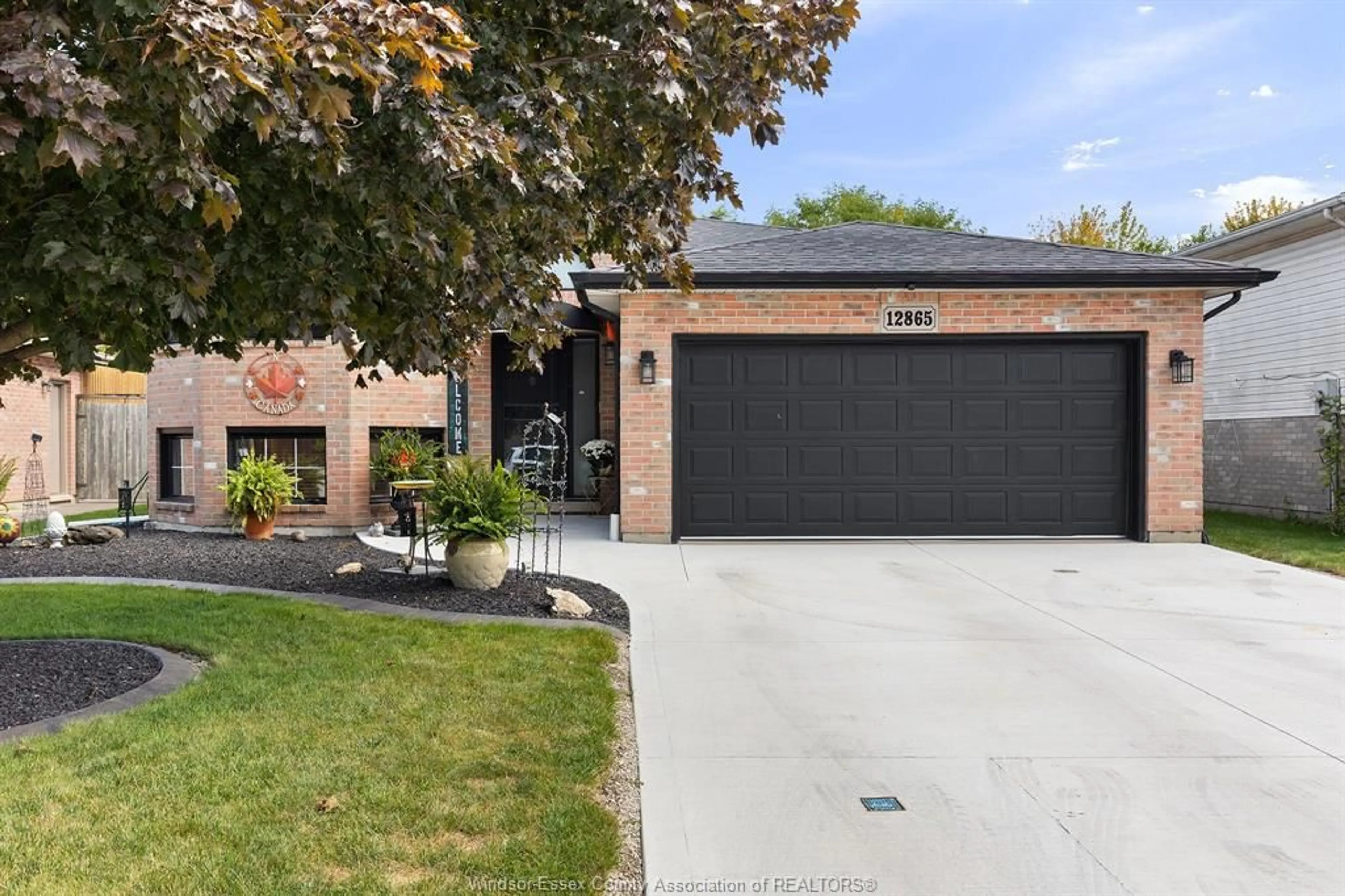 Home with brick exterior material, street for 12865 LEMIRE St, Tecumseh Ontario N8N 4W1