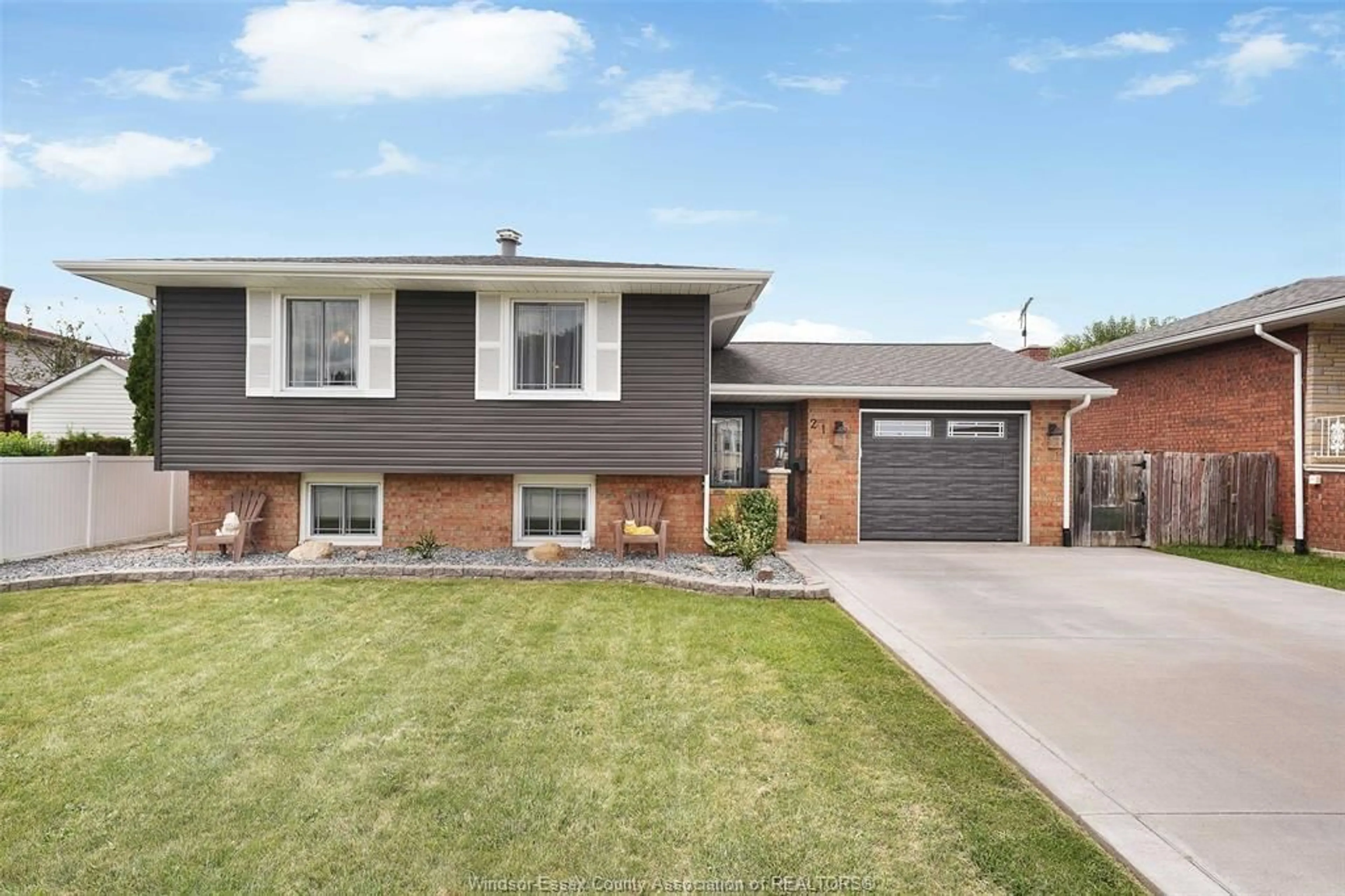 Home with brick exterior material, street for 21 CAMELOT Ave, Leamington Ontario N8H 4T7