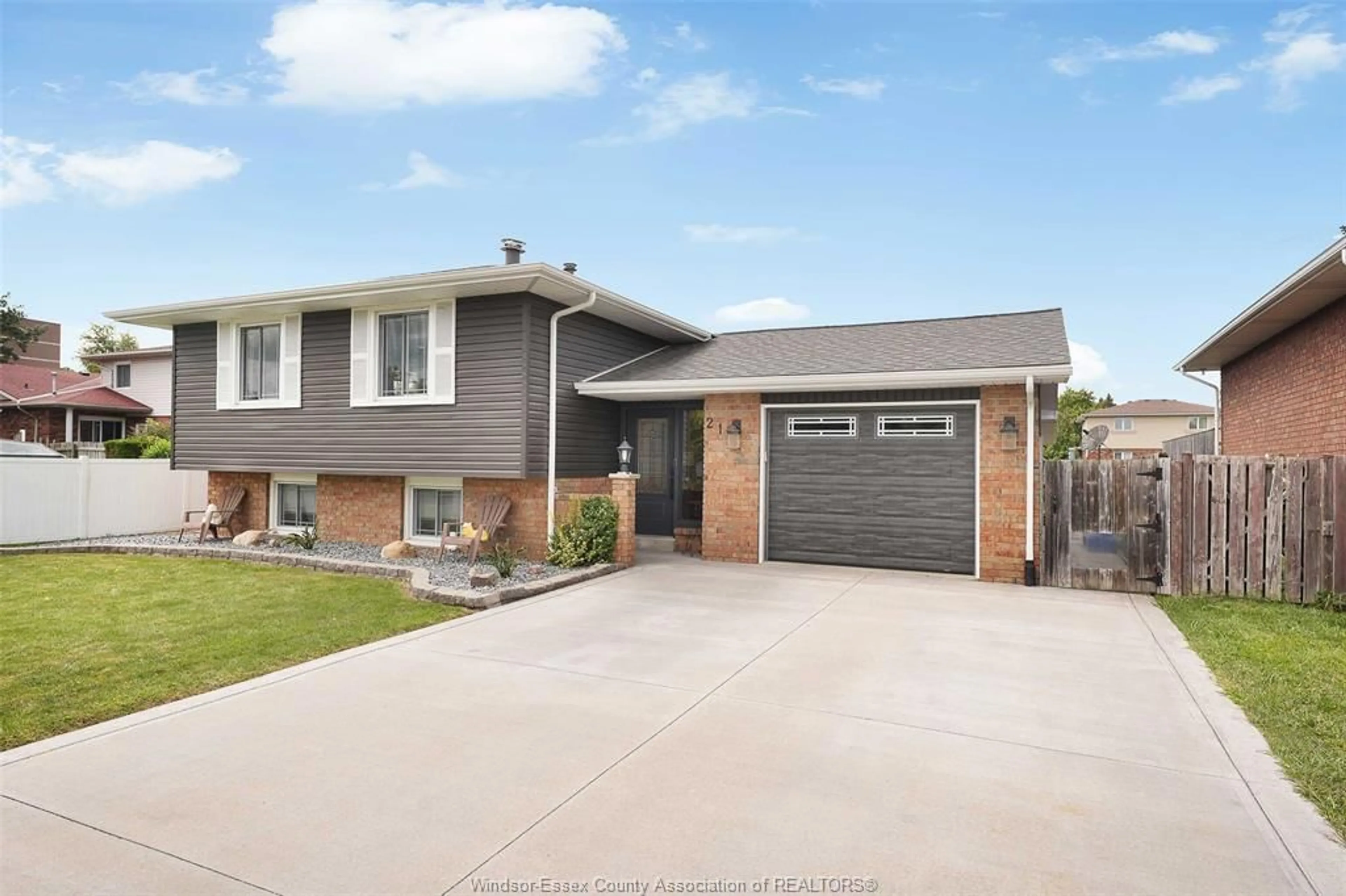 Home with brick exterior material, street for 21 CAMELOT Ave, Leamington Ontario N8H 4T7