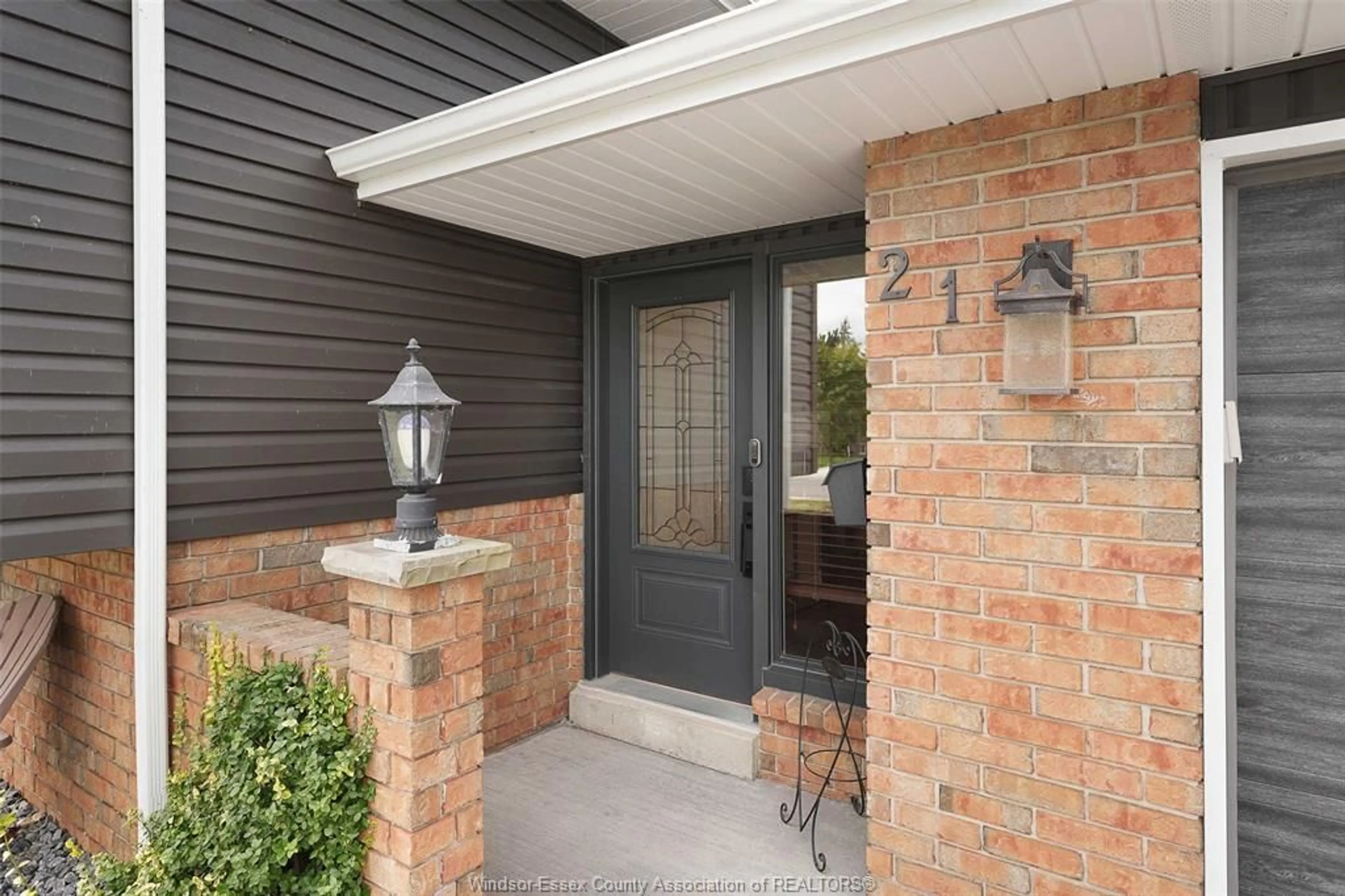 Home with brick exterior material, street for 21 CAMELOT Ave, Leamington Ontario N8H 4T7