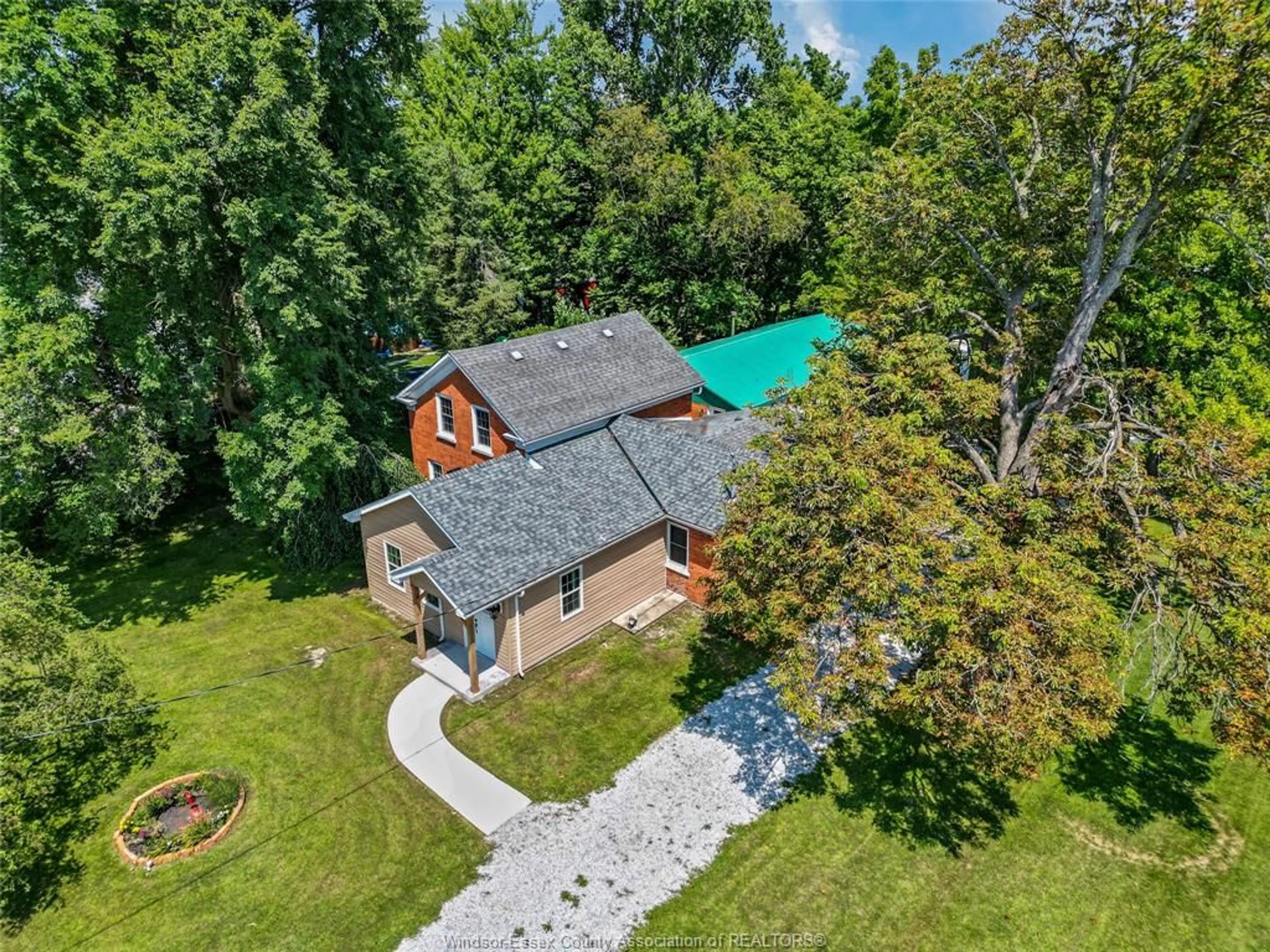 A pic from outside/outdoor area/front of a property/back of a property/a pic from drone, unknown for 458 COUNTY RD 34, North Ridge Ontario N8M 2X5