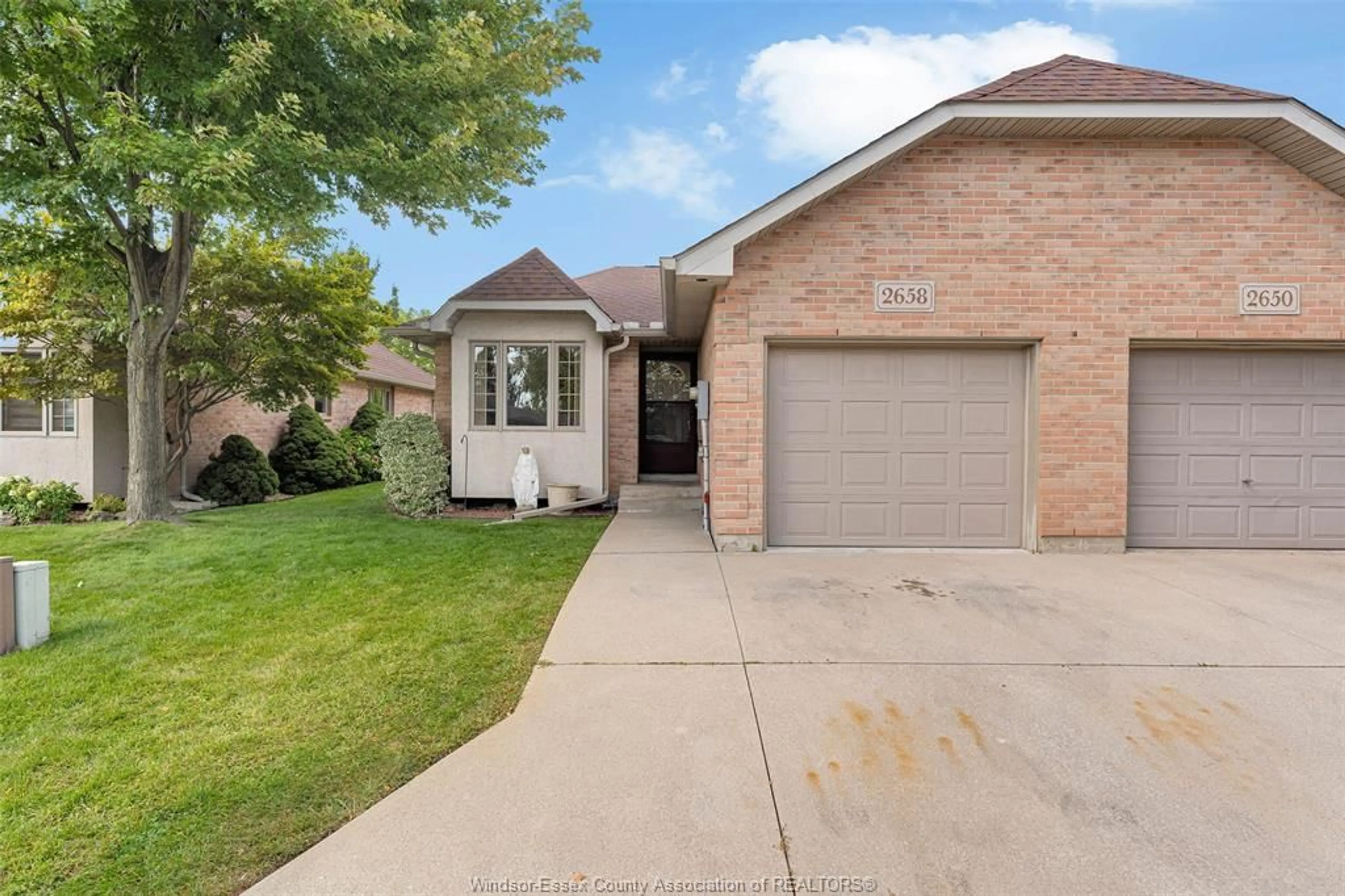 Home with brick exterior material, street for 2658 NORFOLK PINES Cres, Windsor Ontario N9E 4S5