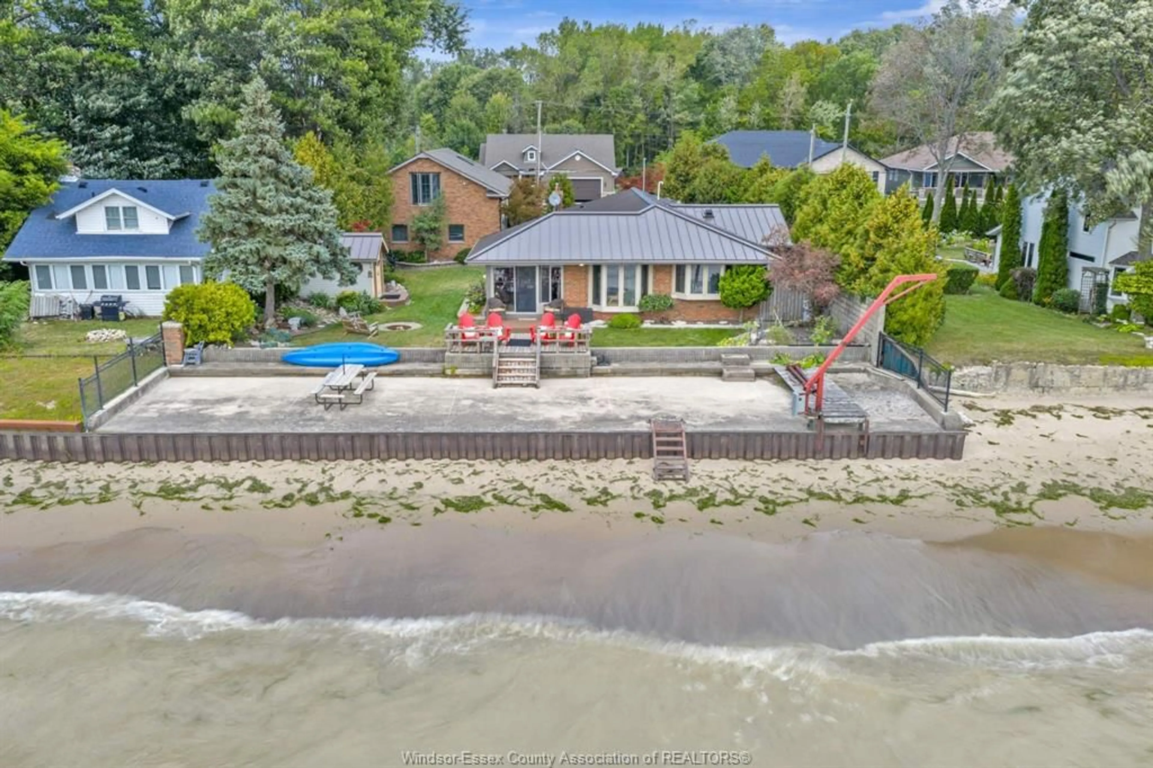 A pic from outside/outdoor area/front of a property/back of a property/a pic from drone, water/lake/river/ocean view for 223 Lakewood, Amherstburg Ontario N9V 2Y8