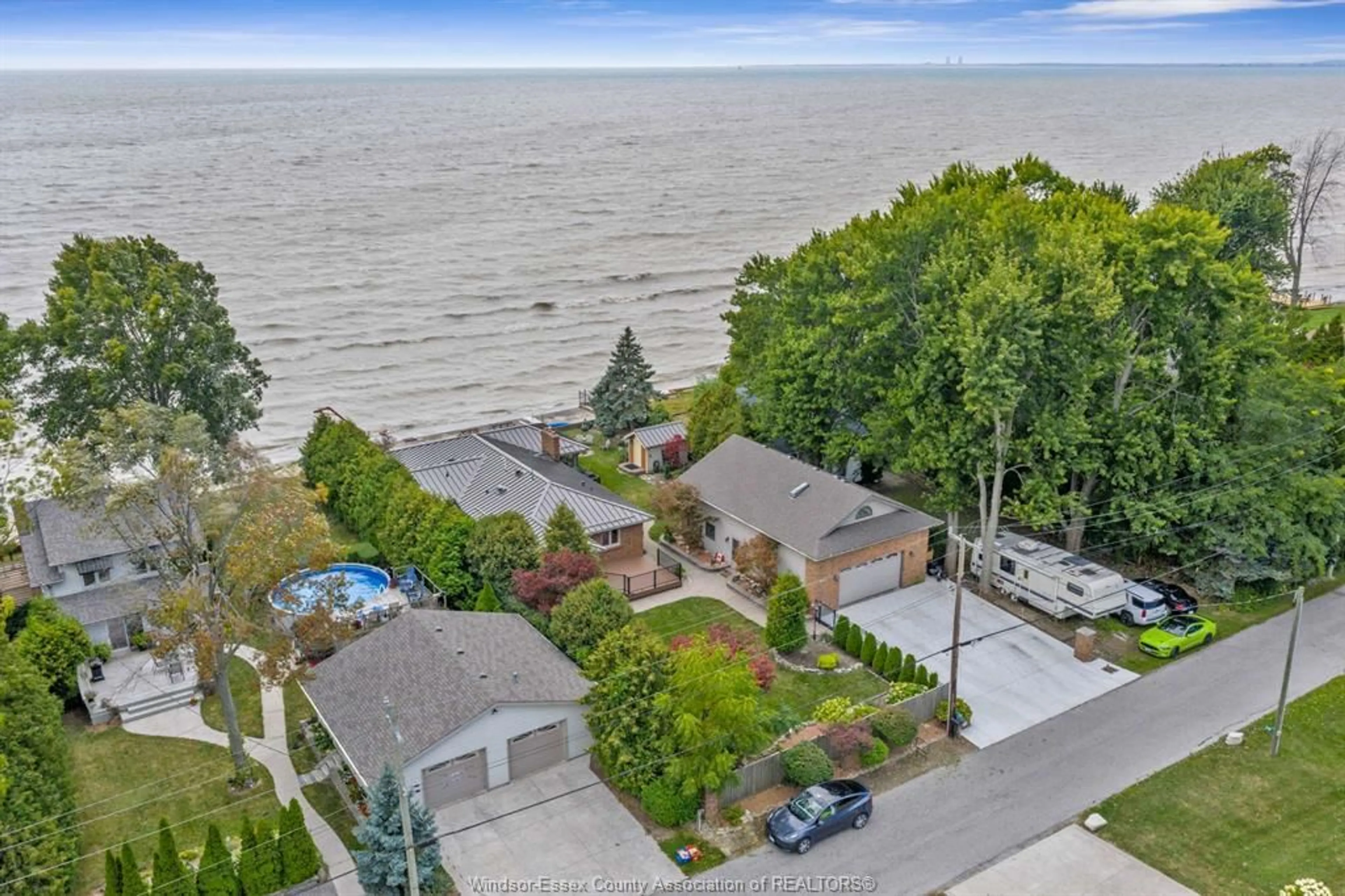 A pic from outside/outdoor area/front of a property/back of a property/a pic from drone, water/lake/river/ocean view for 223 Lakewood, Amherstburg Ontario N9V 2Y8