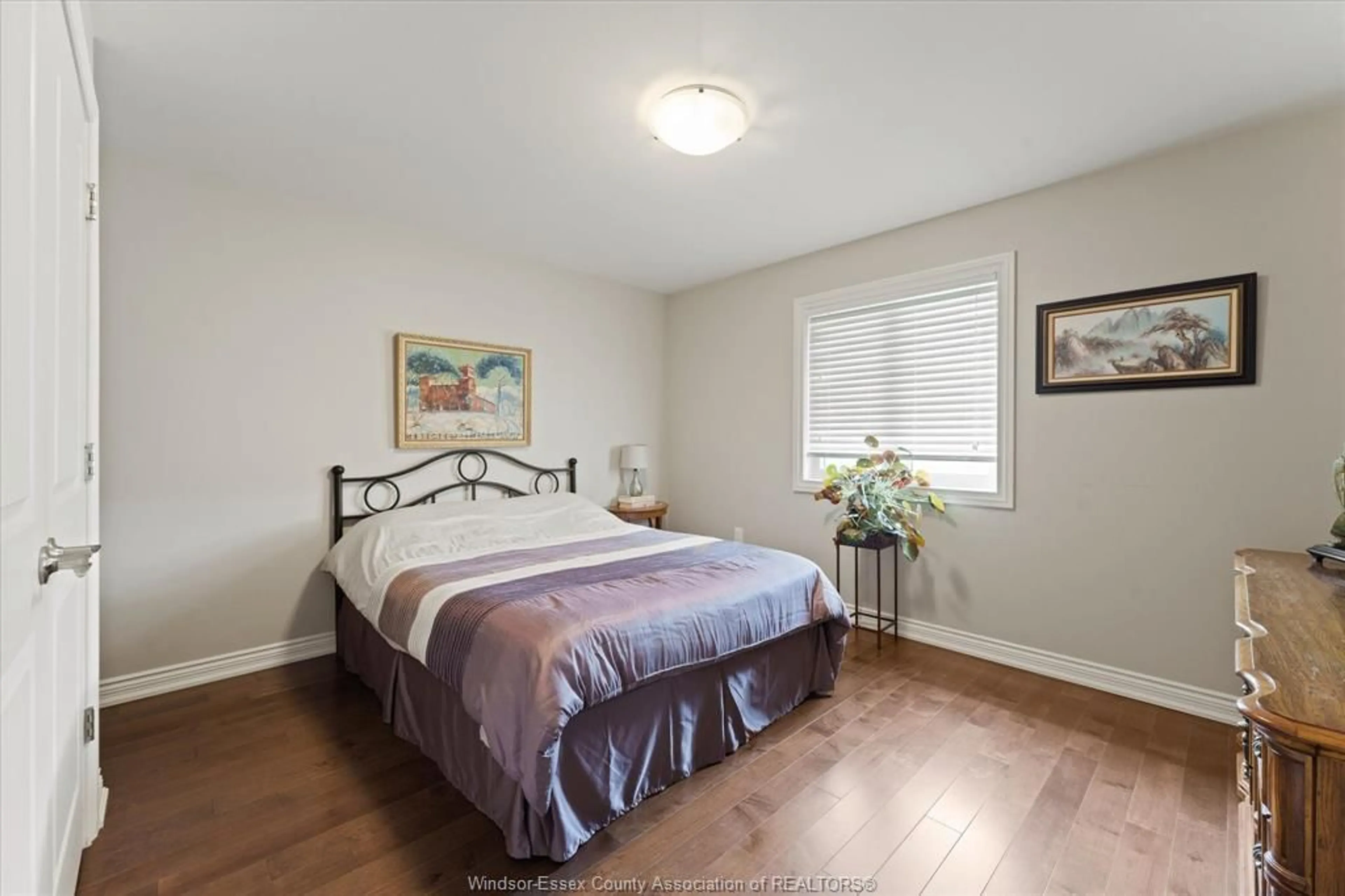 Bedroom with bed, wood/laminate floor for 4601 8TH CONCESSION, Windsor Ontario N0R 1K0