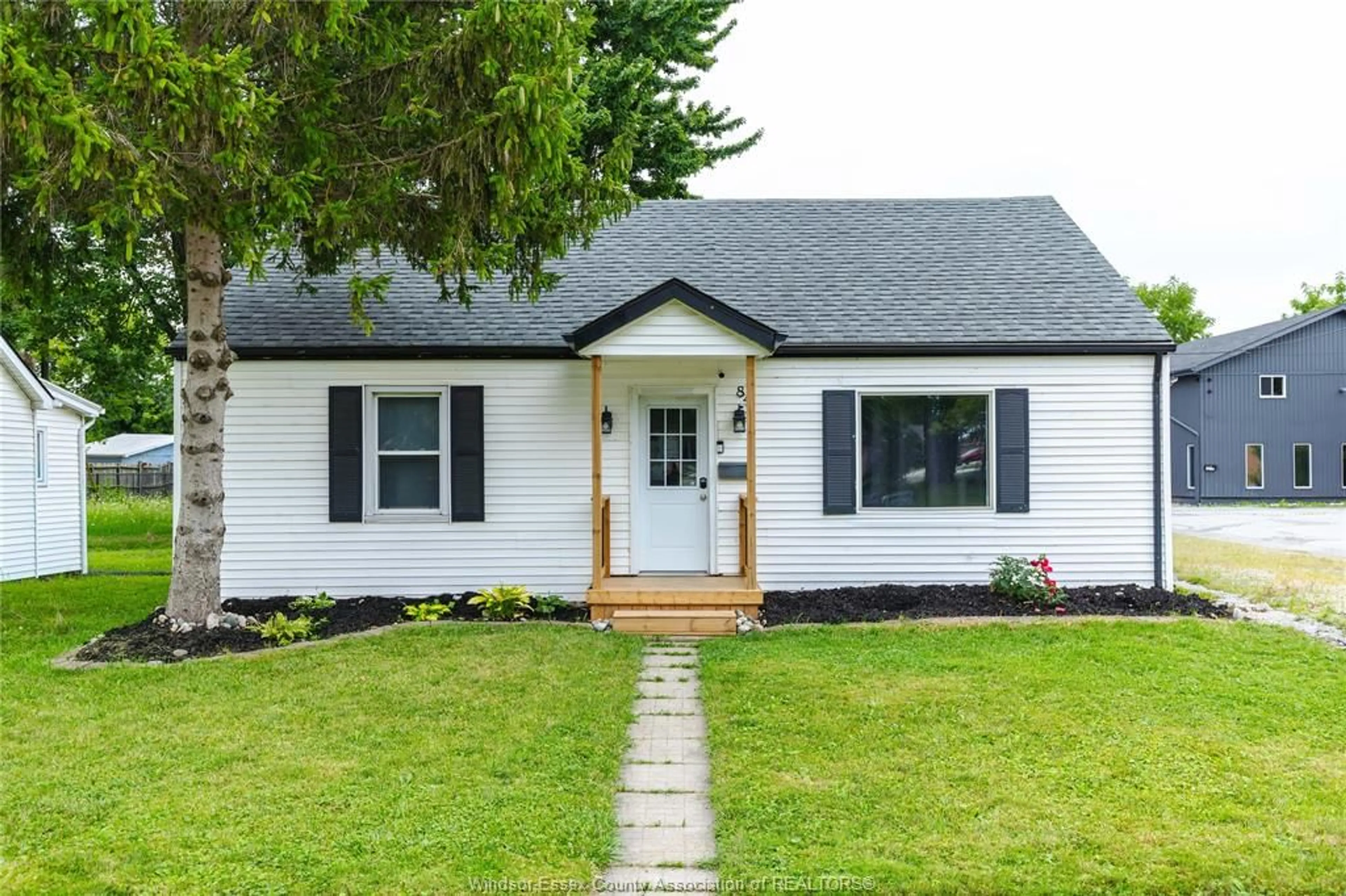 Home with vinyl exterior material, street for 84 CAMERON, Essex Ontario N8M 2L5