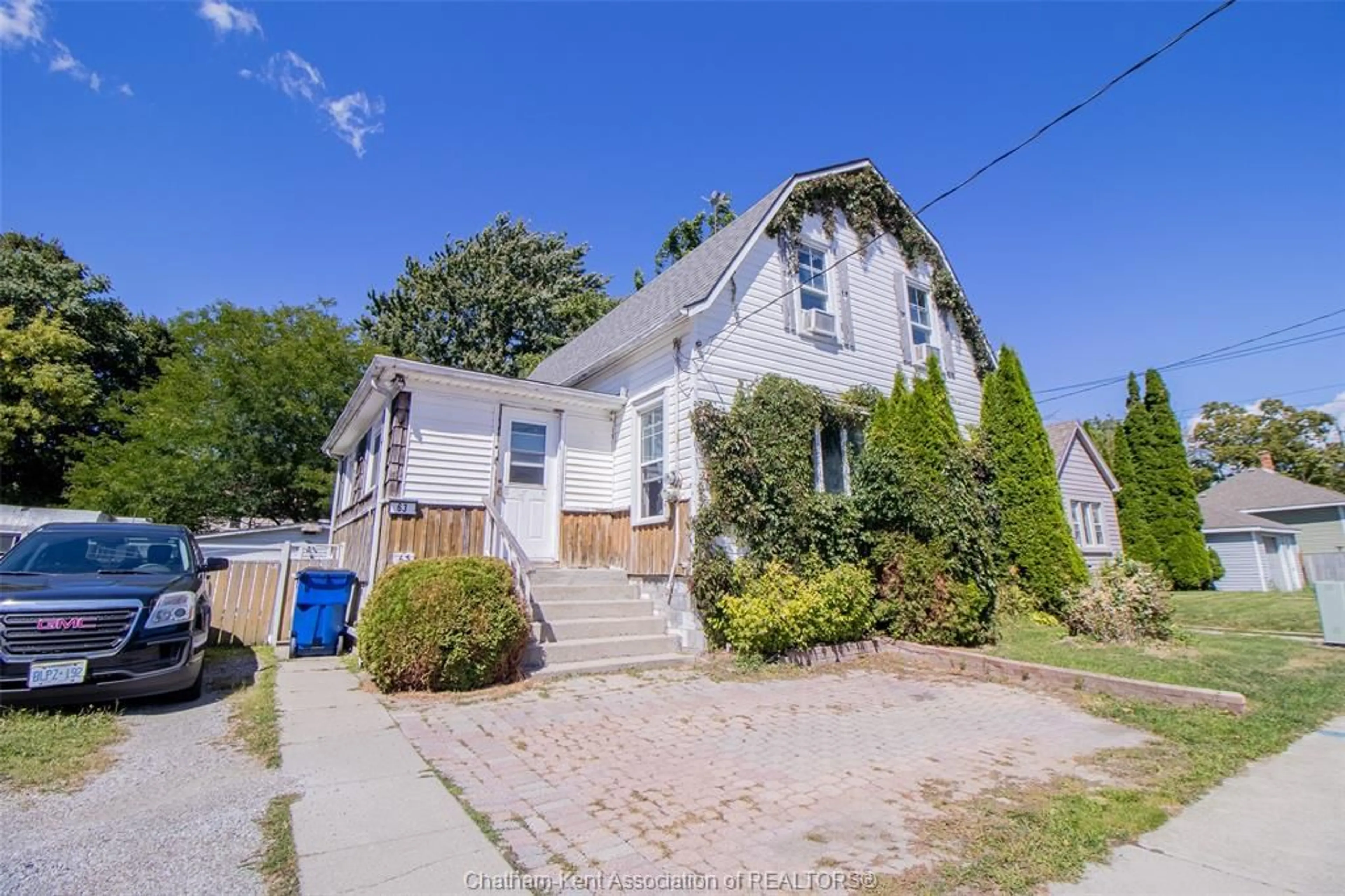 A pic from outside/outdoor area/front of a property/back of a property/a pic from drone, street for 63 Spencer Ave, Chatham Ontario N7M 1V5