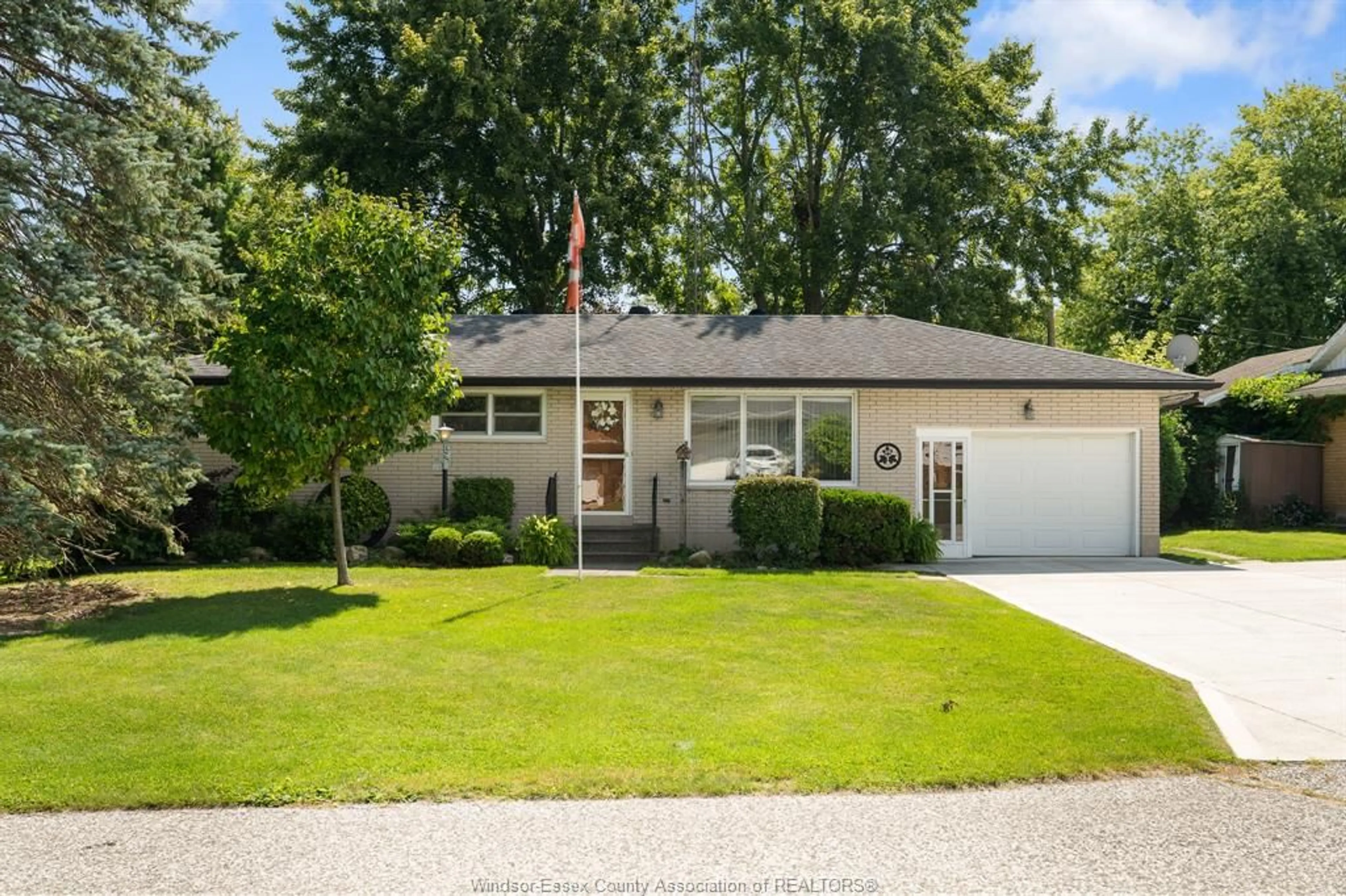 Home with vinyl exterior material, street for 106 George Ave, Wheatley Ontario N0P 2P0