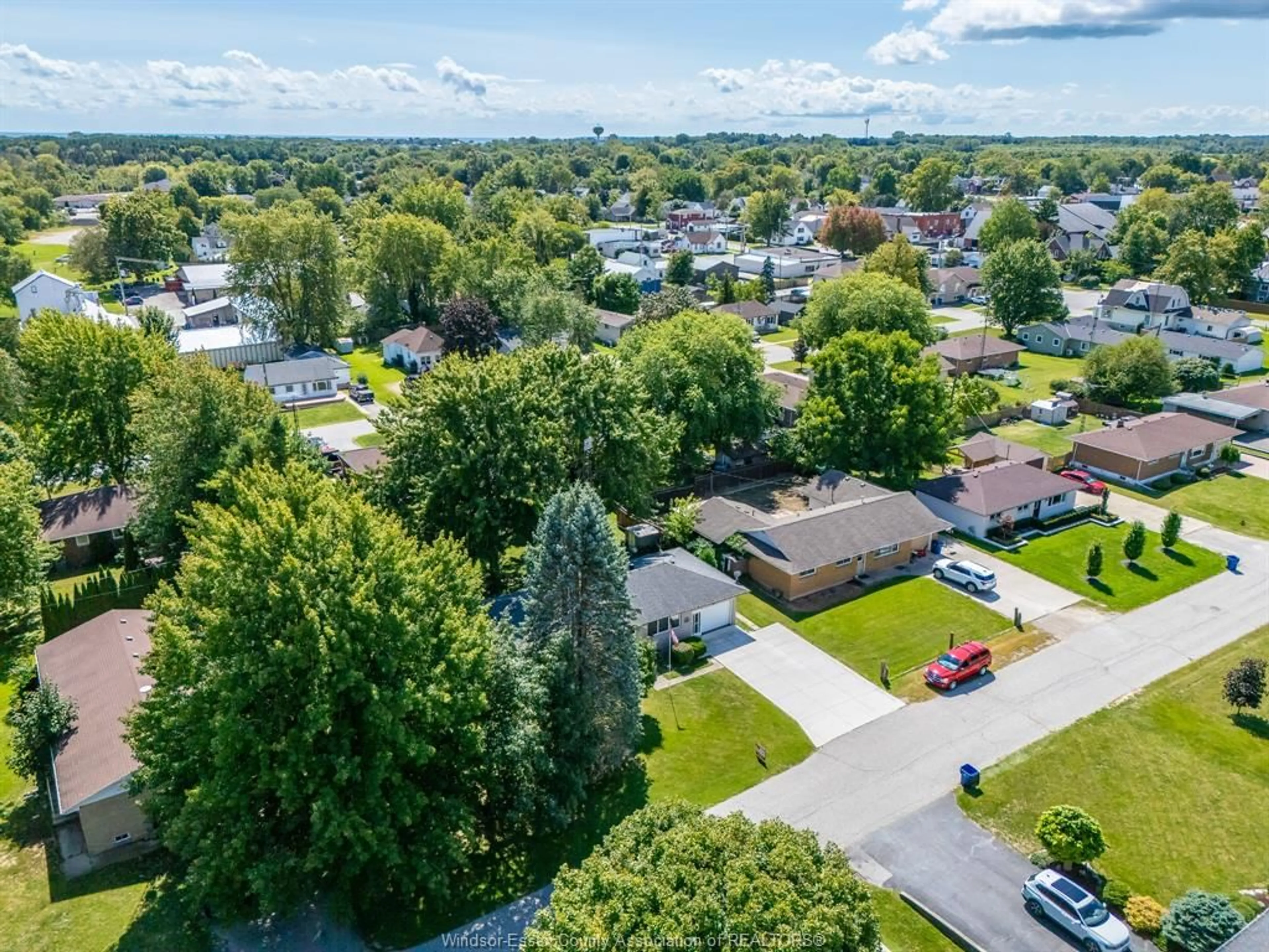 A pic from outside/outdoor area/front of a property/back of a property/a pic from drone, unknown for 106 George Ave, Wheatley Ontario N0P 2P0