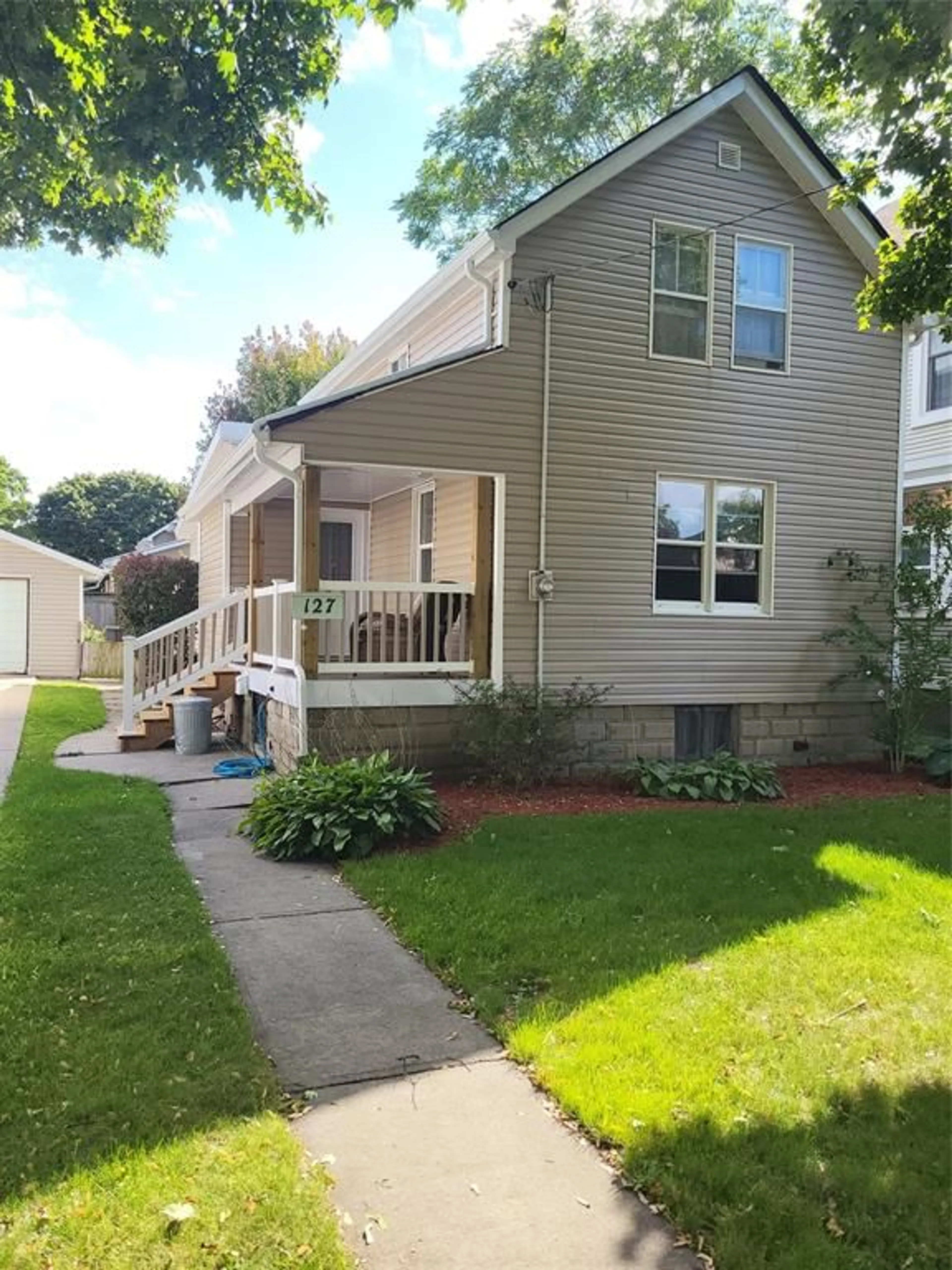 Home with vinyl exterior material, street for 127 Cameron St, Sarnia Ontario N7T 4A7