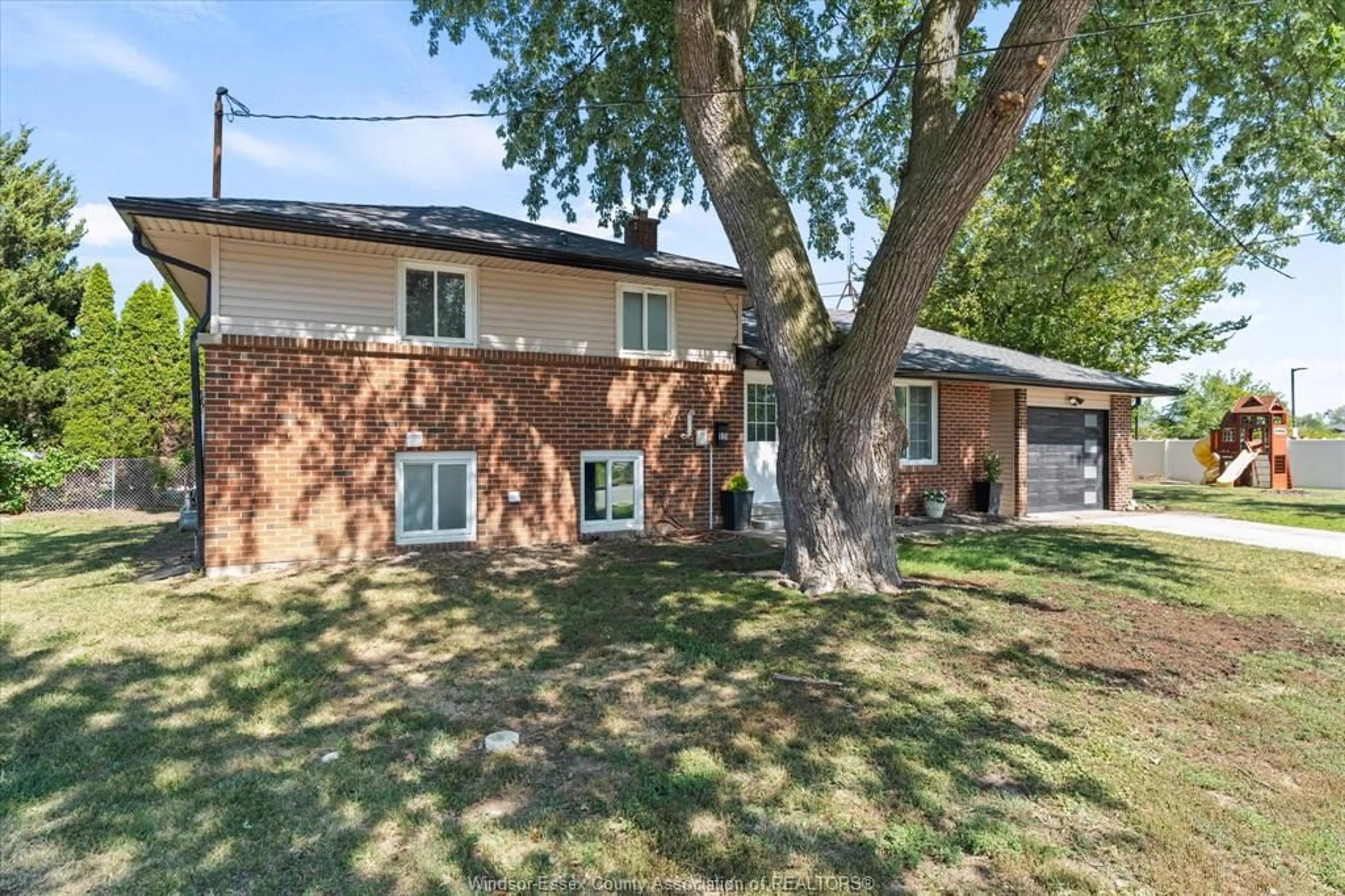 Home with brick exterior material, street for 528 SANDISON St, Windsor Ontario N9E 1R7