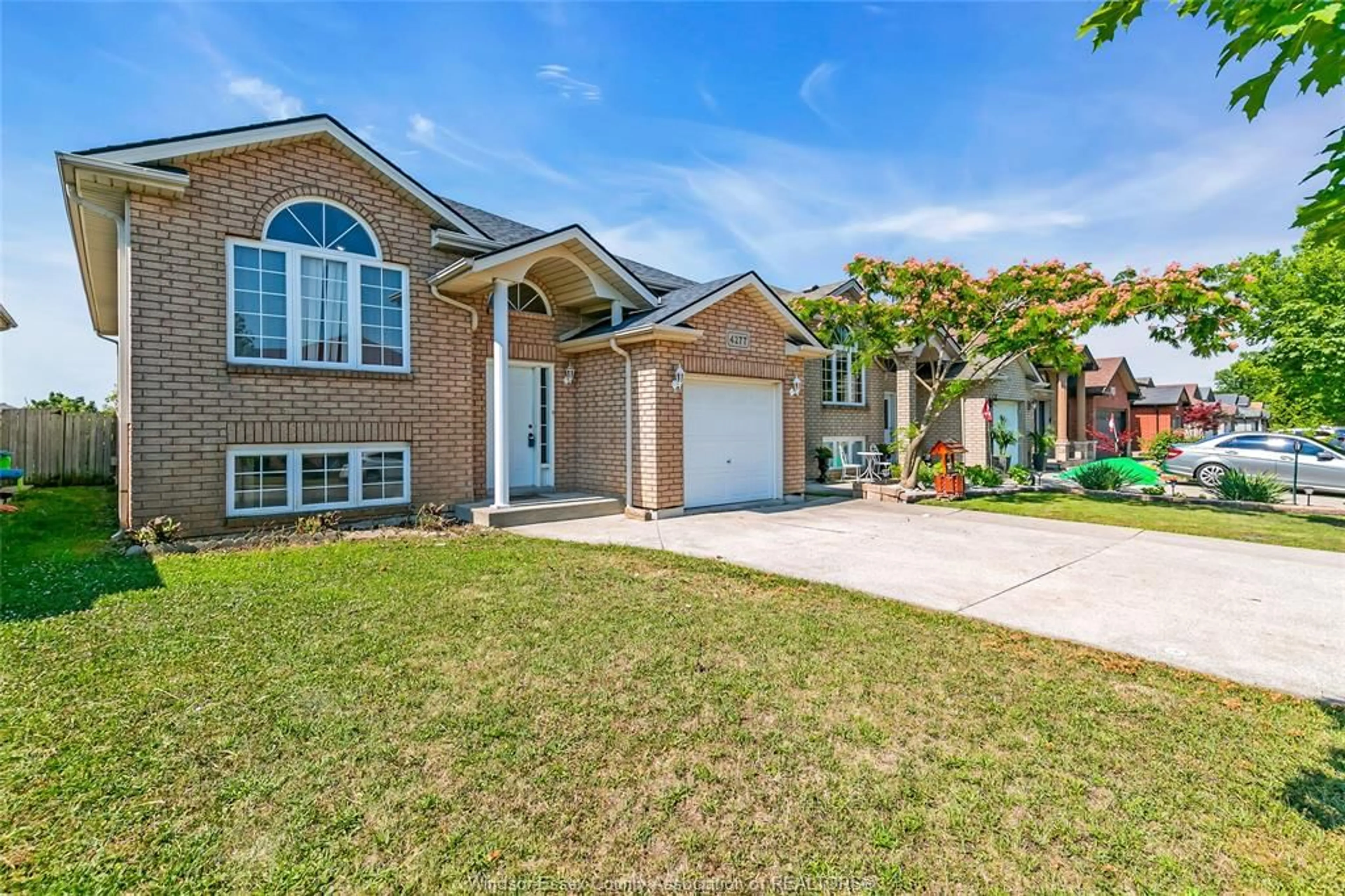 Home with brick exterior material, street for 4277 SPAGO Cres, Windsor Ontario N9G 2Z7