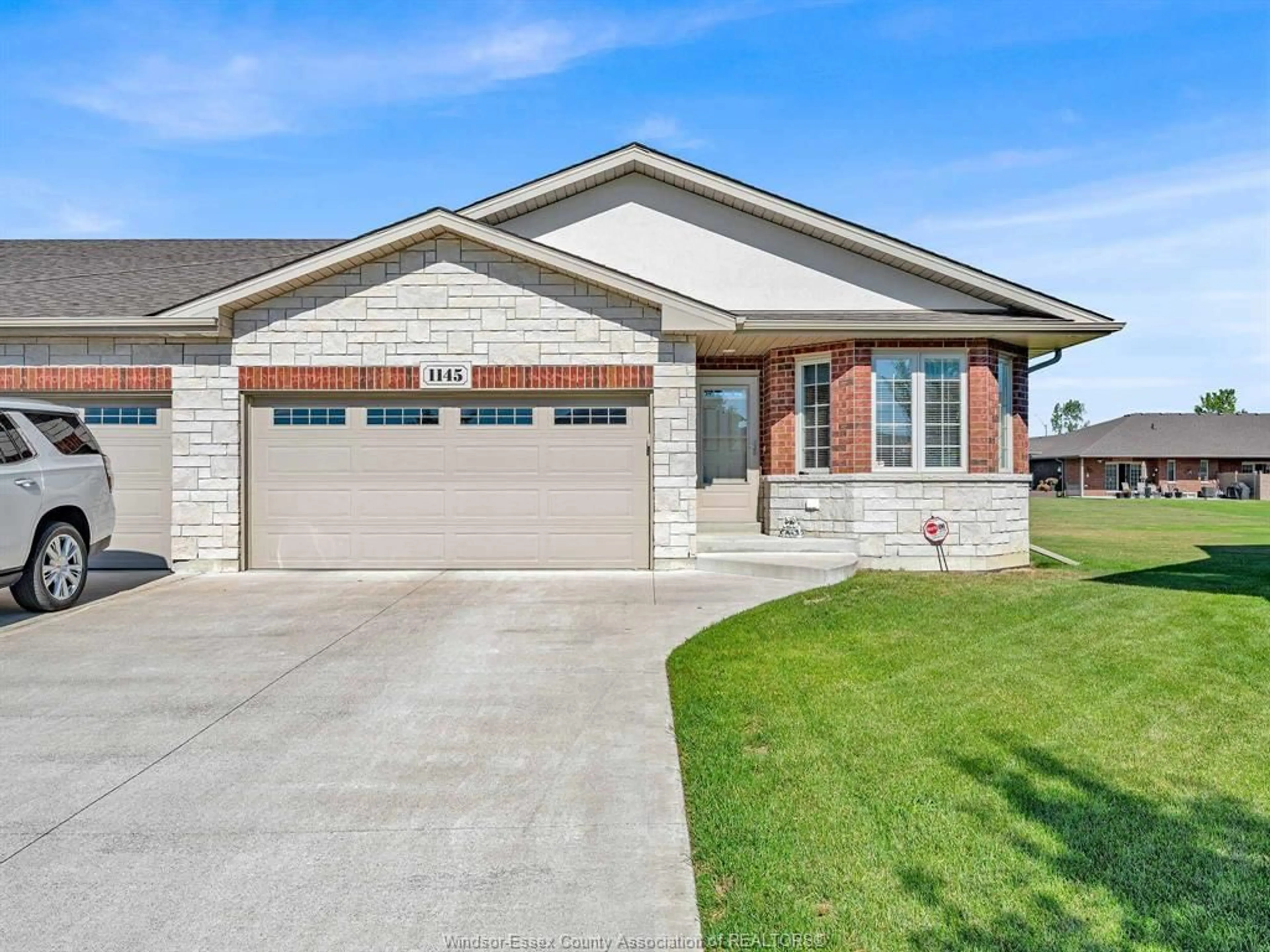Home with brick exterior material, street for 1145 Bridal Falls, Windsor Ontario N8P 0C4