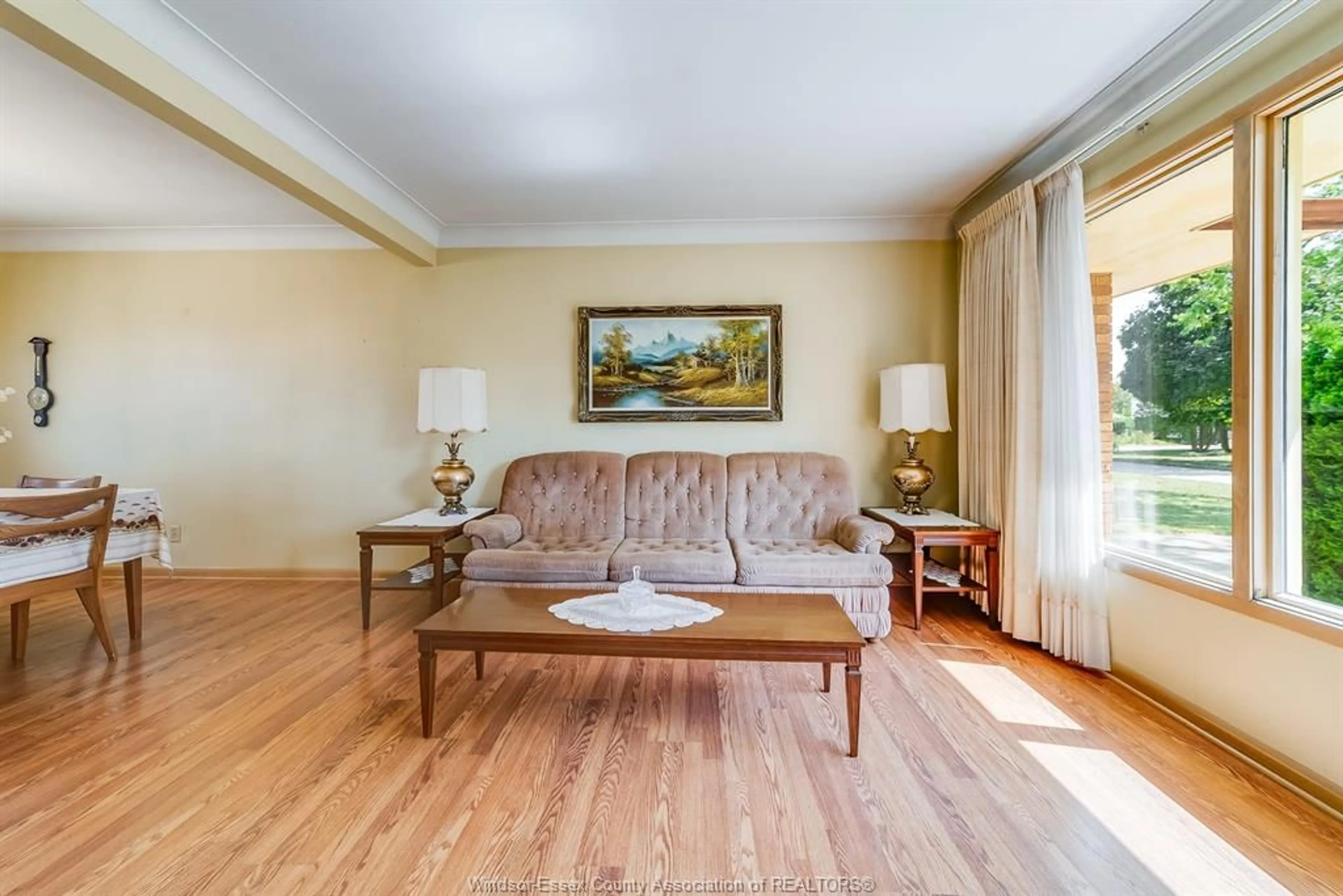 Living room with furniture, wood/laminate floor for 744 LYNN St, Windsor Ontario N9G 1G7