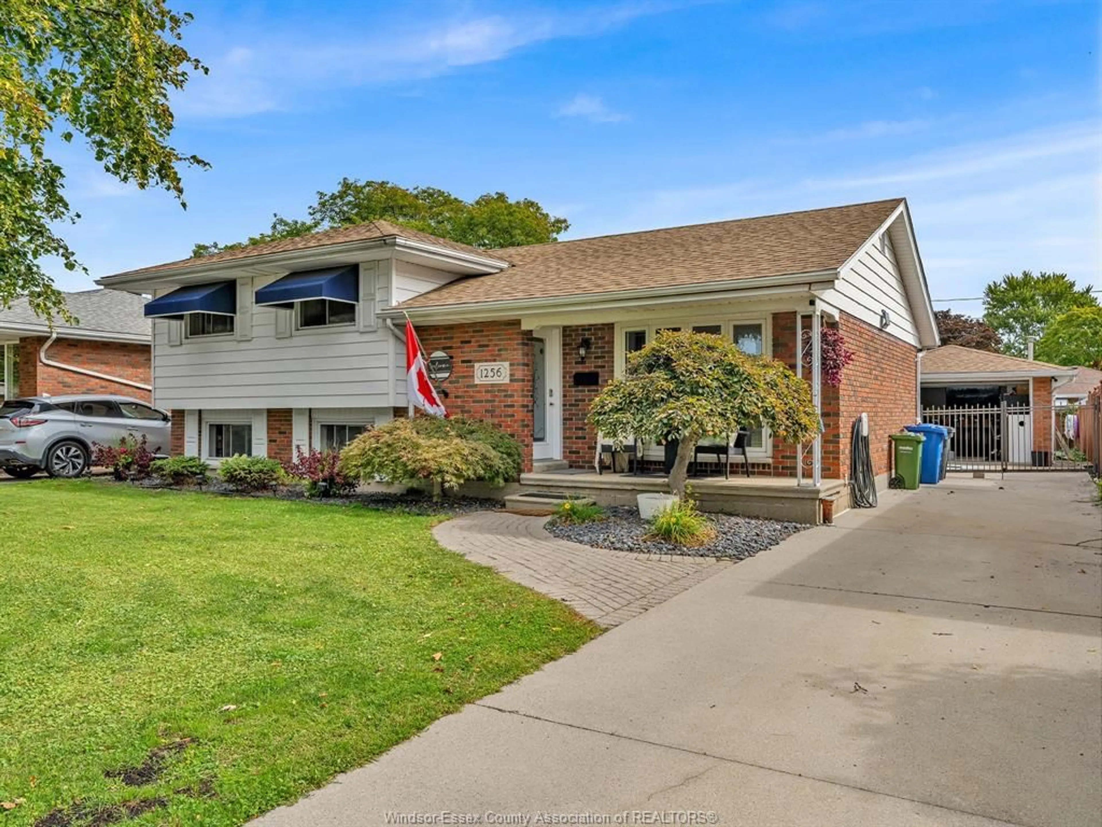 Home with brick exterior material, street for 1256 JANISSE Dr, Windsor Ontario N8S 2W3
