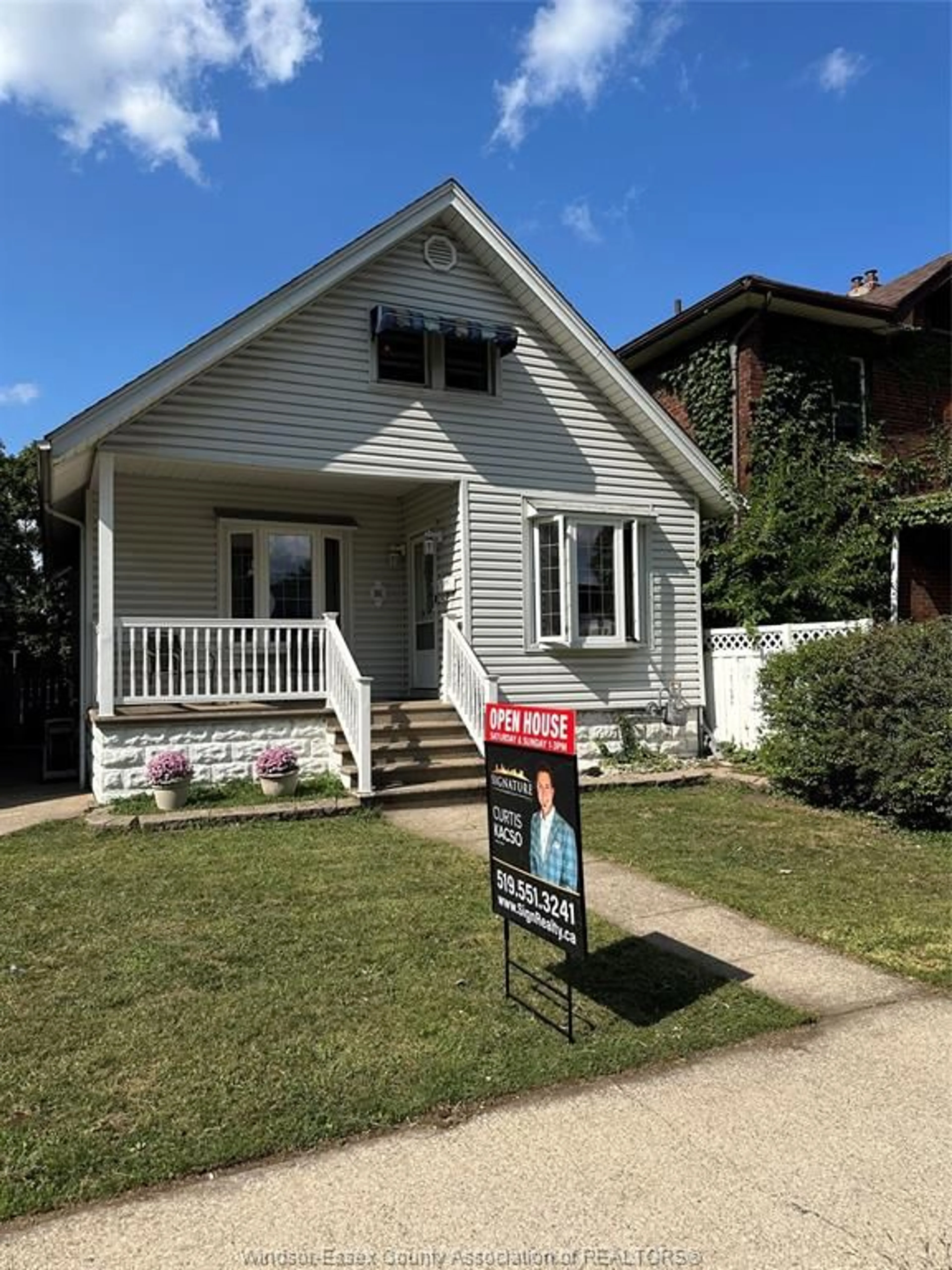 Home with vinyl exterior material, street for 86 HANNA St, Windsor Ontario N8X 2M9