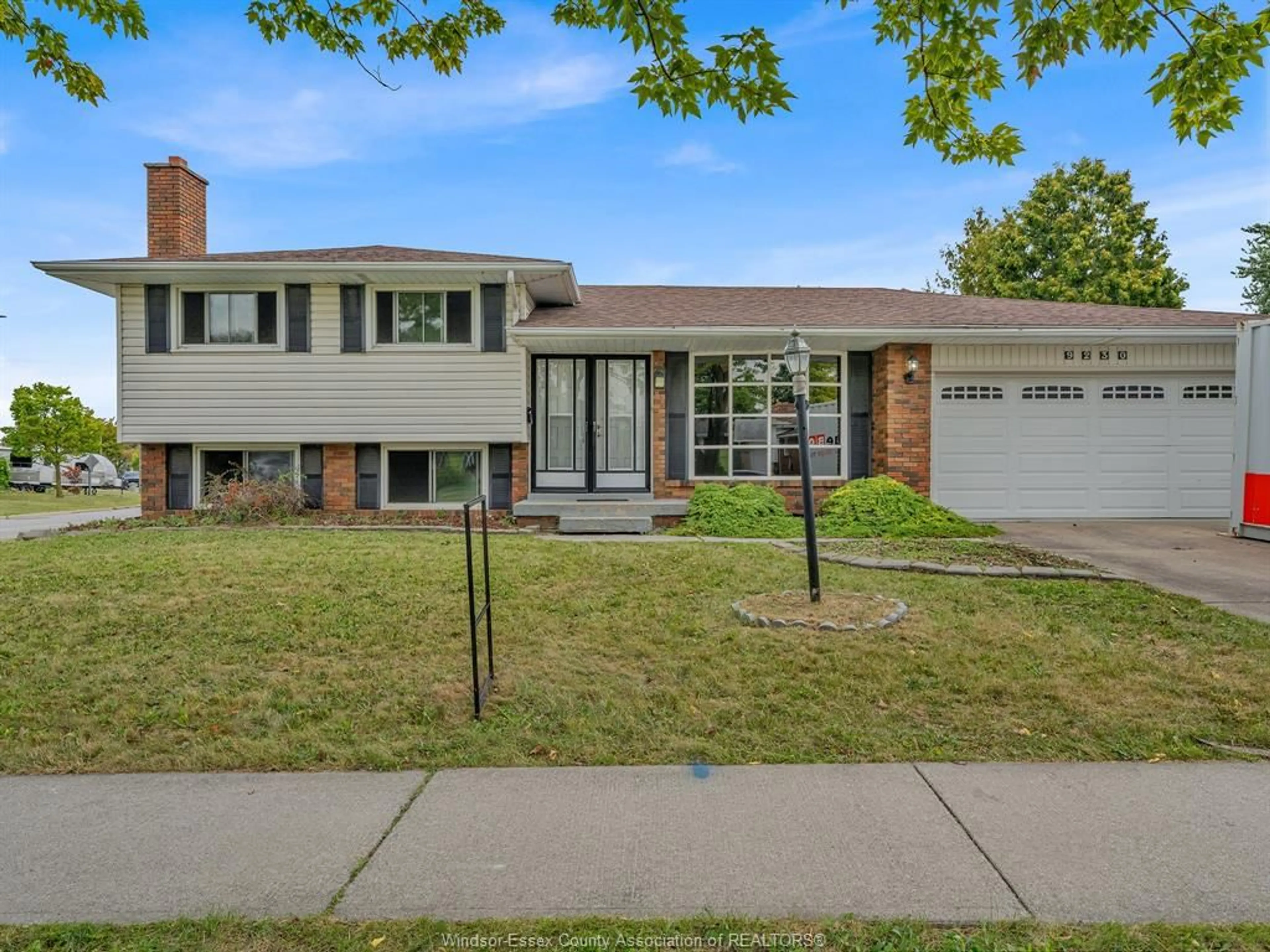 Home with brick exterior material, street for 9230 BEACHDALE Rd, Windsor Ontario N8R 1R9
