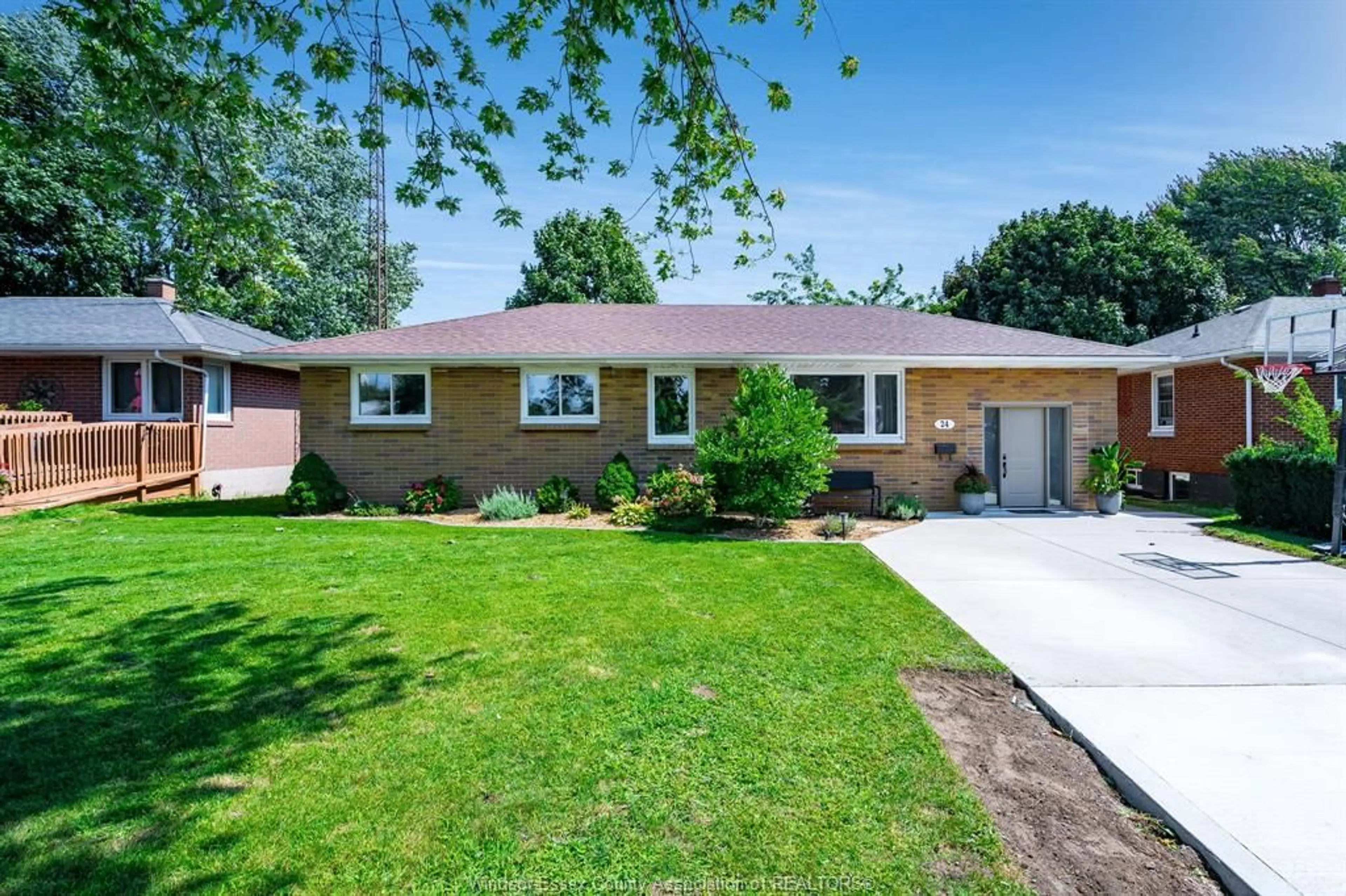 Home with vinyl exterior material, street for 24 SHERMAN, Leamington Ontario N8H 2S1
