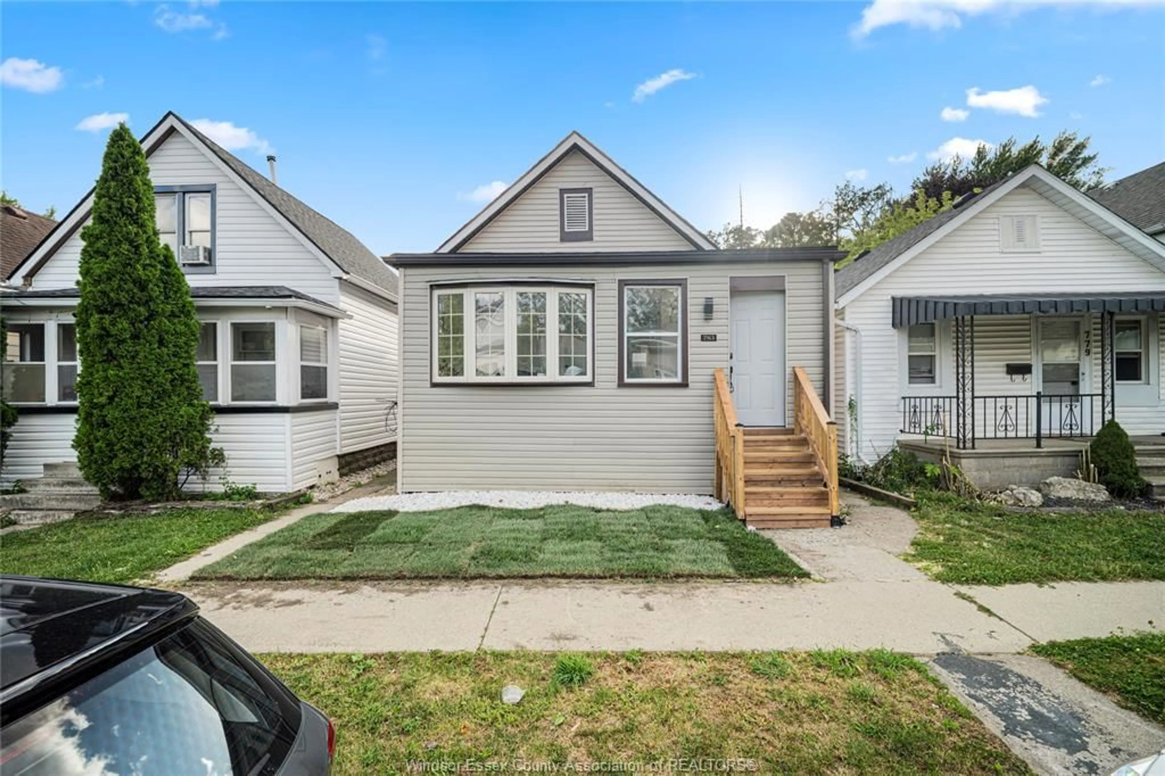 Home with vinyl exterior material, street for 783 Bridge Ave, Windsor Ontario N9B 2M5