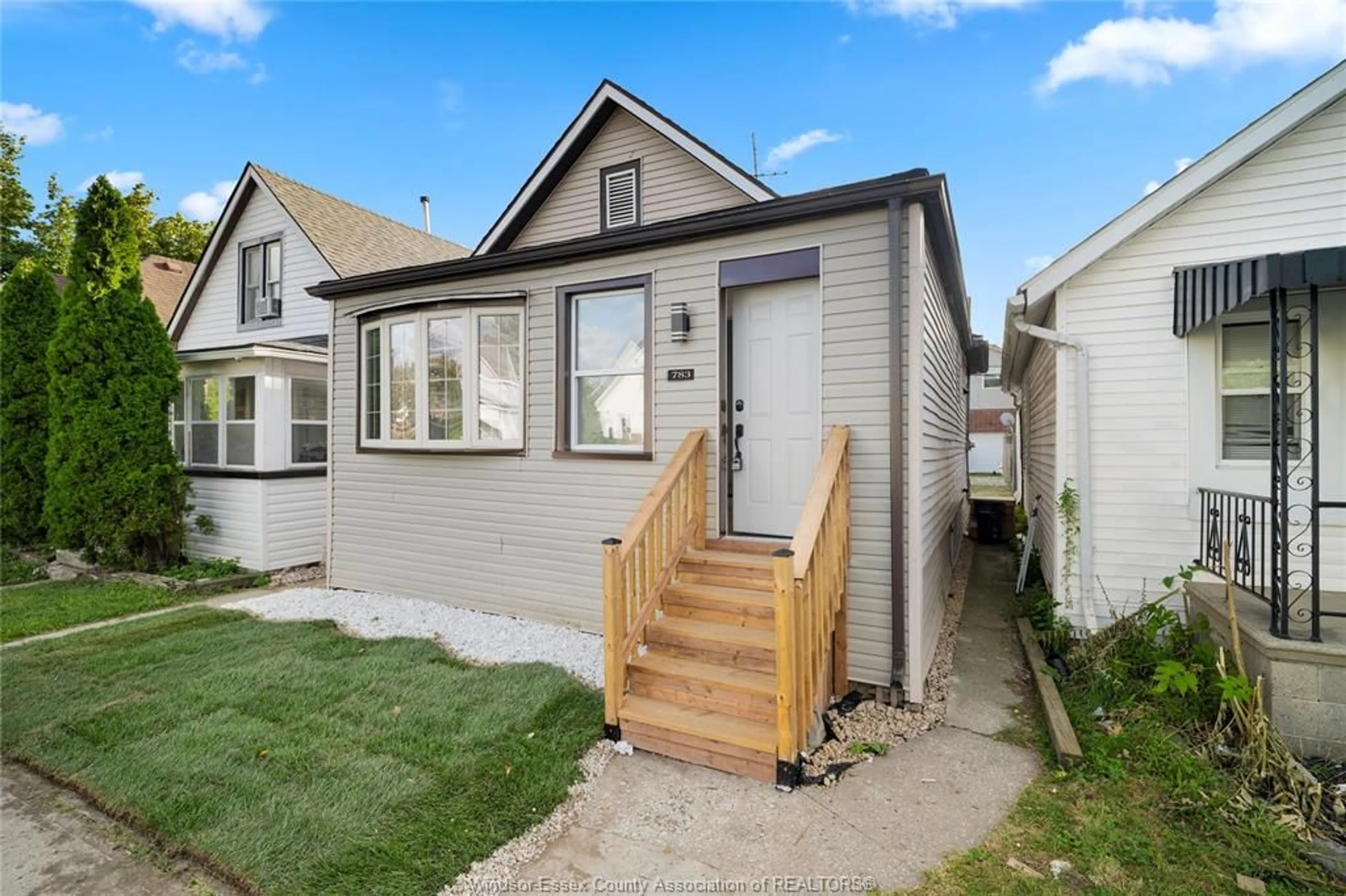 Home with vinyl exterior material, street for 783 Bridge Ave, Windsor Ontario N9B 2M5