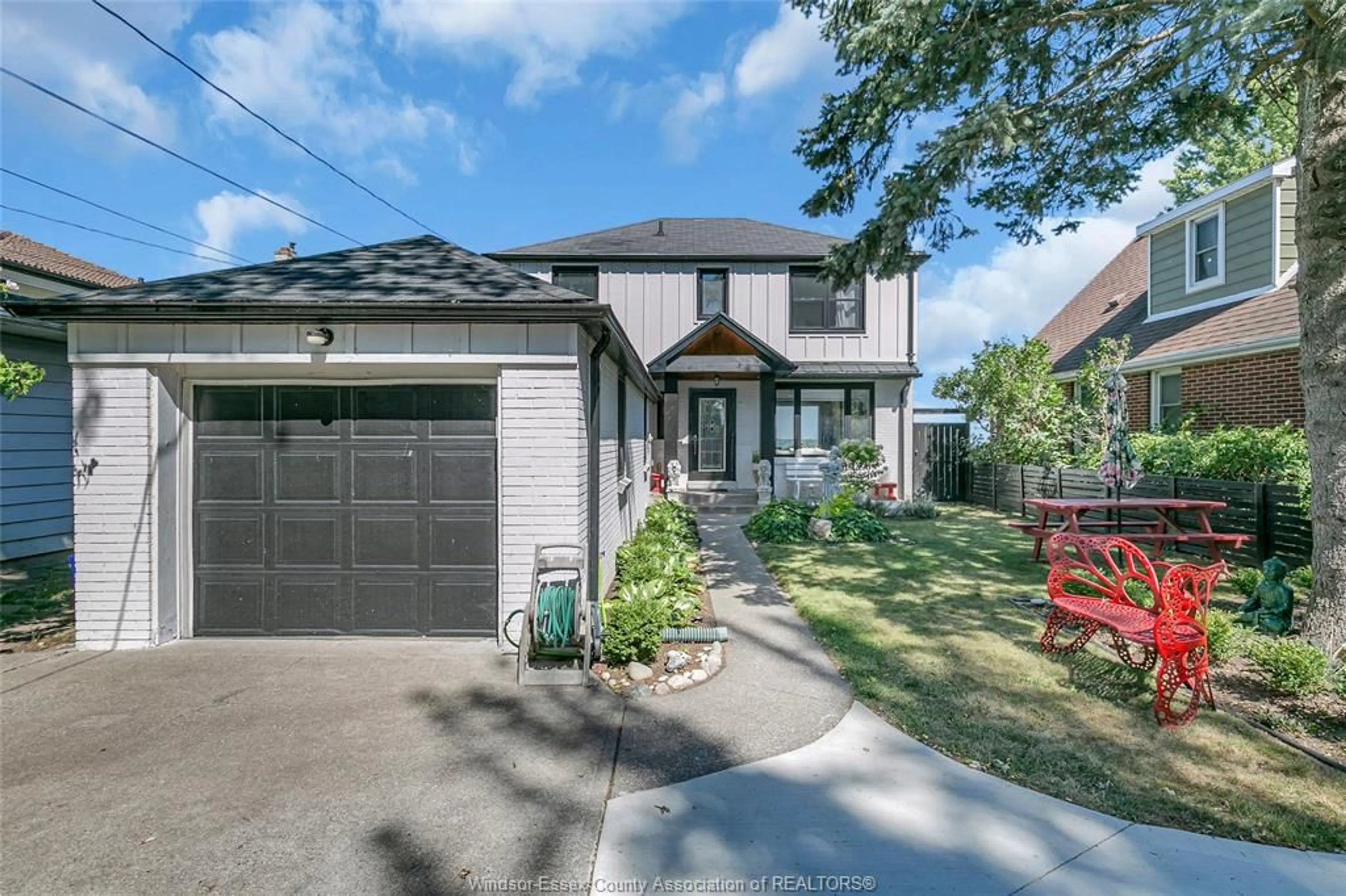Home with brick exterior material, street for 11360 RIVERSIDE Dr, Windsor Ontario N8P 1A4