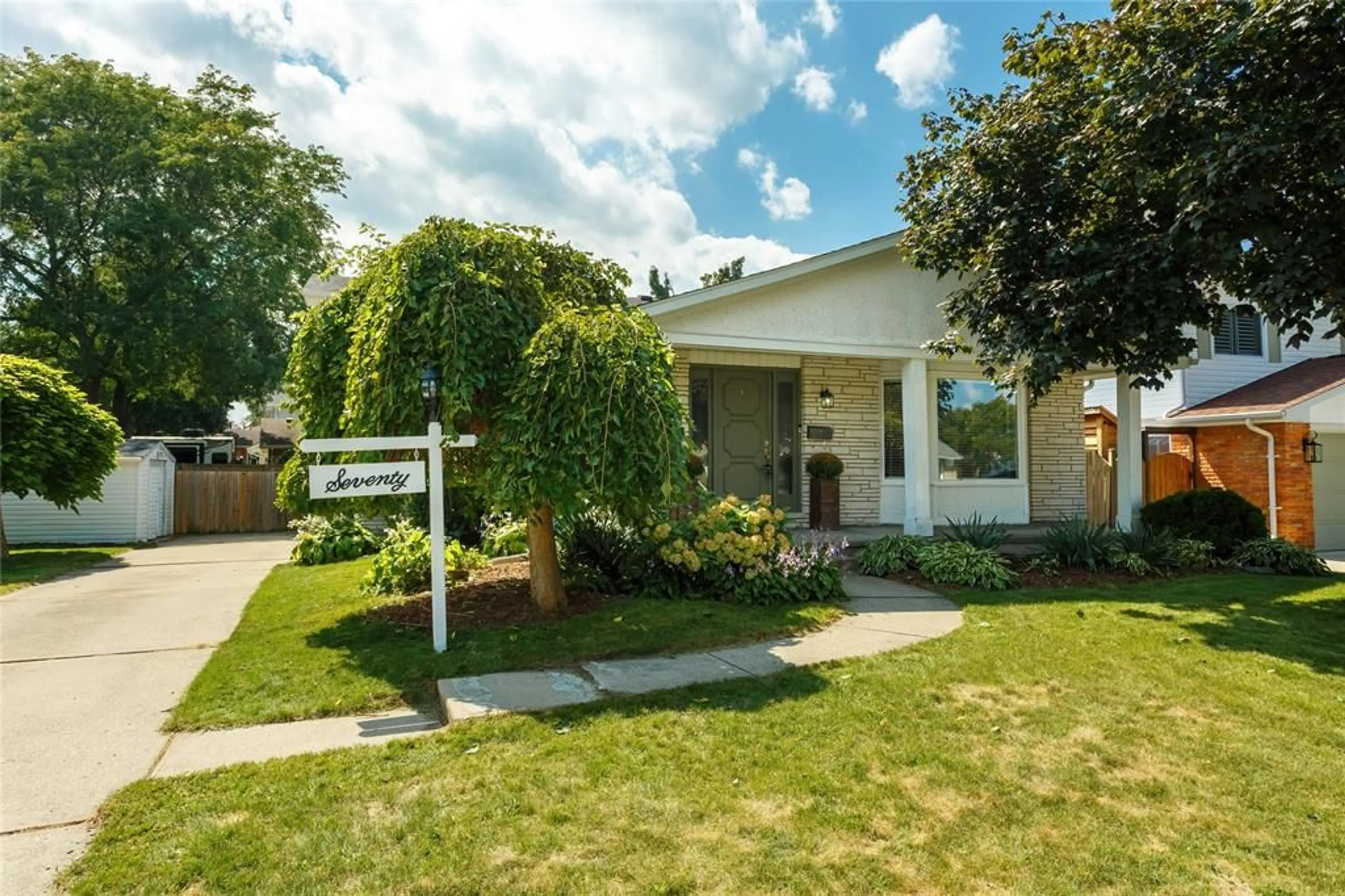 Home with vinyl exterior material, street for 70 Ashby Cres, Sarnia Ontario N7S 4L6