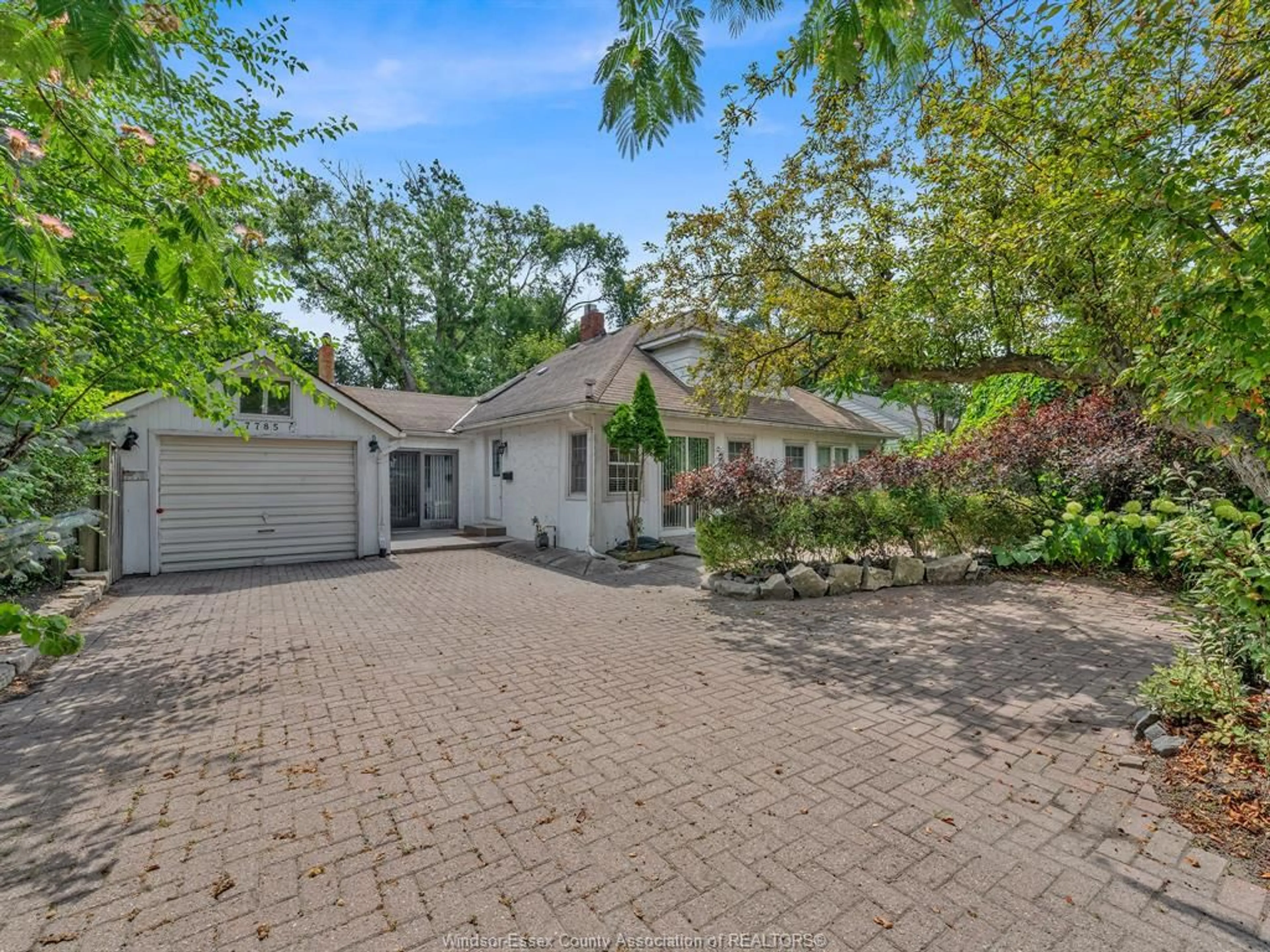A pic from outside/outdoor area/front of a property/back of a property/a pic from drone, street for 7785 RIVERSIDE Dr, Windsor Ontario N8S 1E1