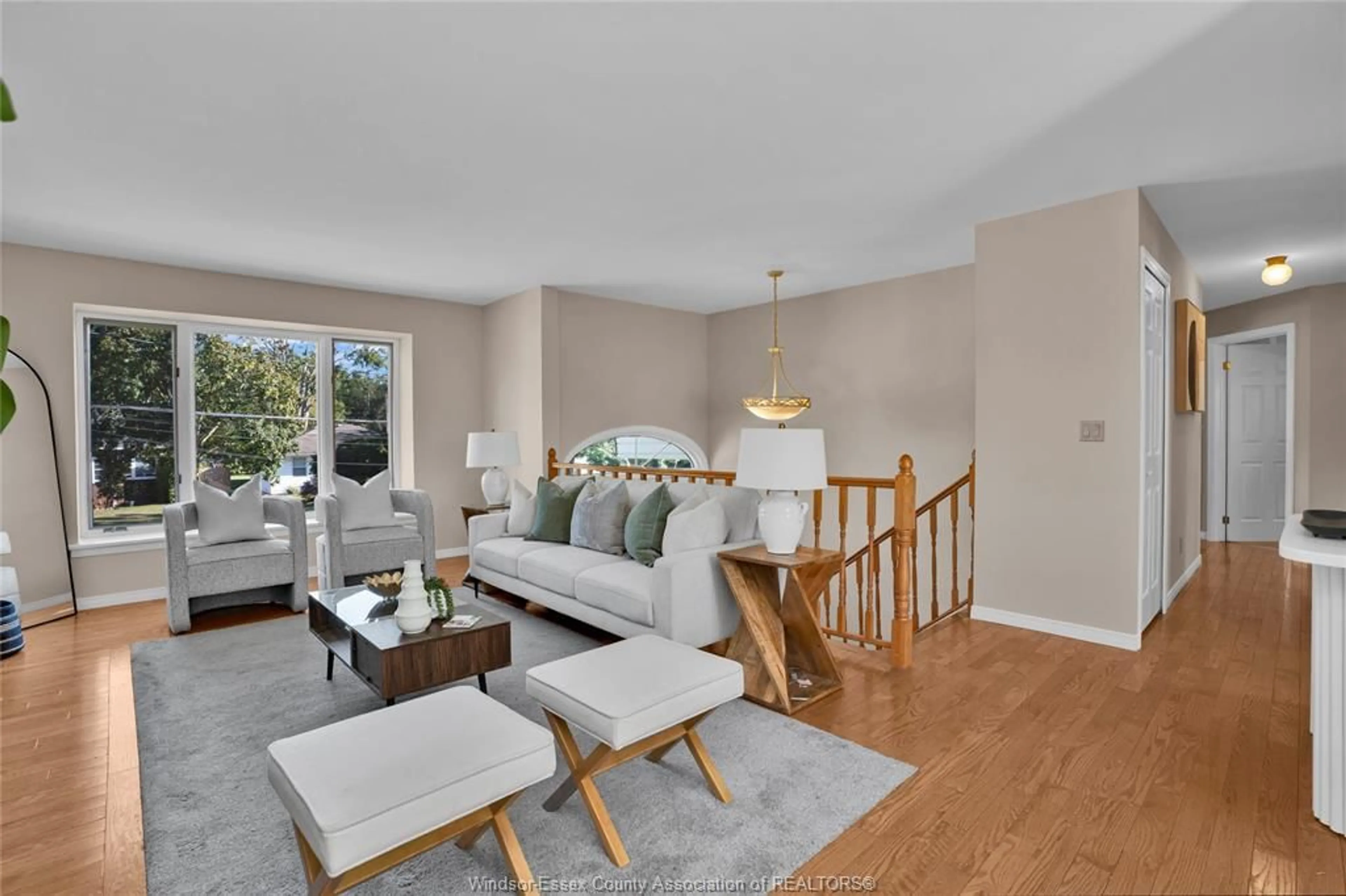 Living room with furniture, wood/laminate floor for 21 PULFORD St, Kingsville Ontario N9Y 1B3