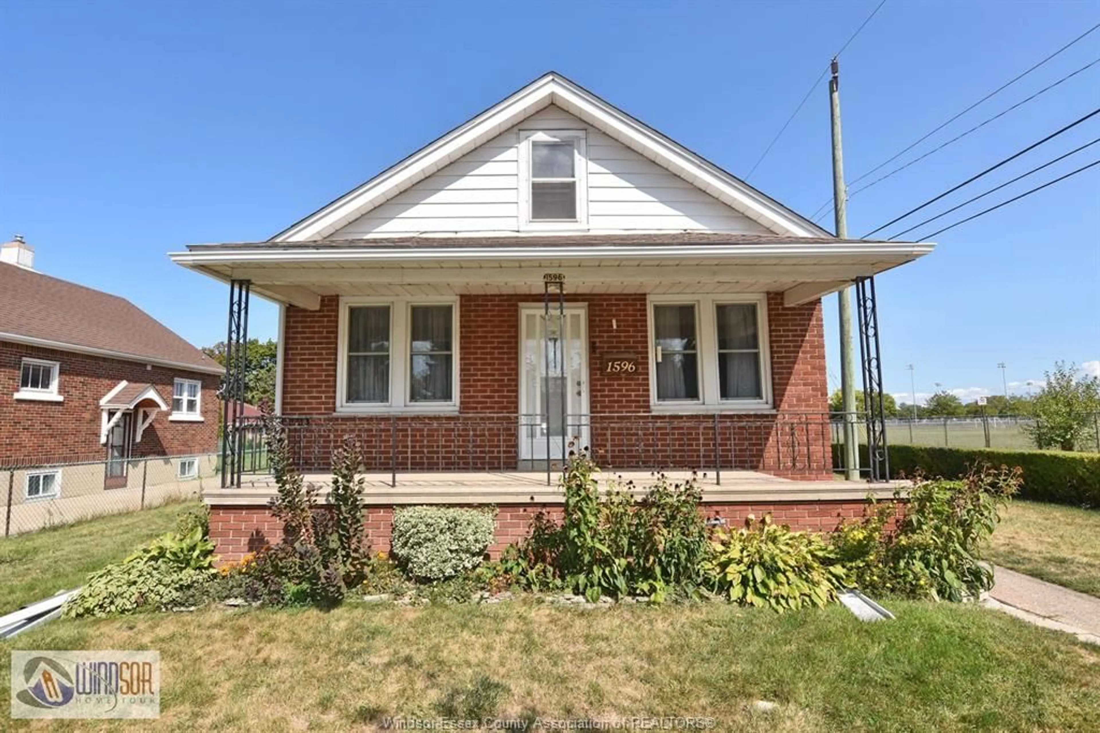 Home with brick exterior material, street for 1596 ALEXIS, Windsor Ontario N8Y 4P2