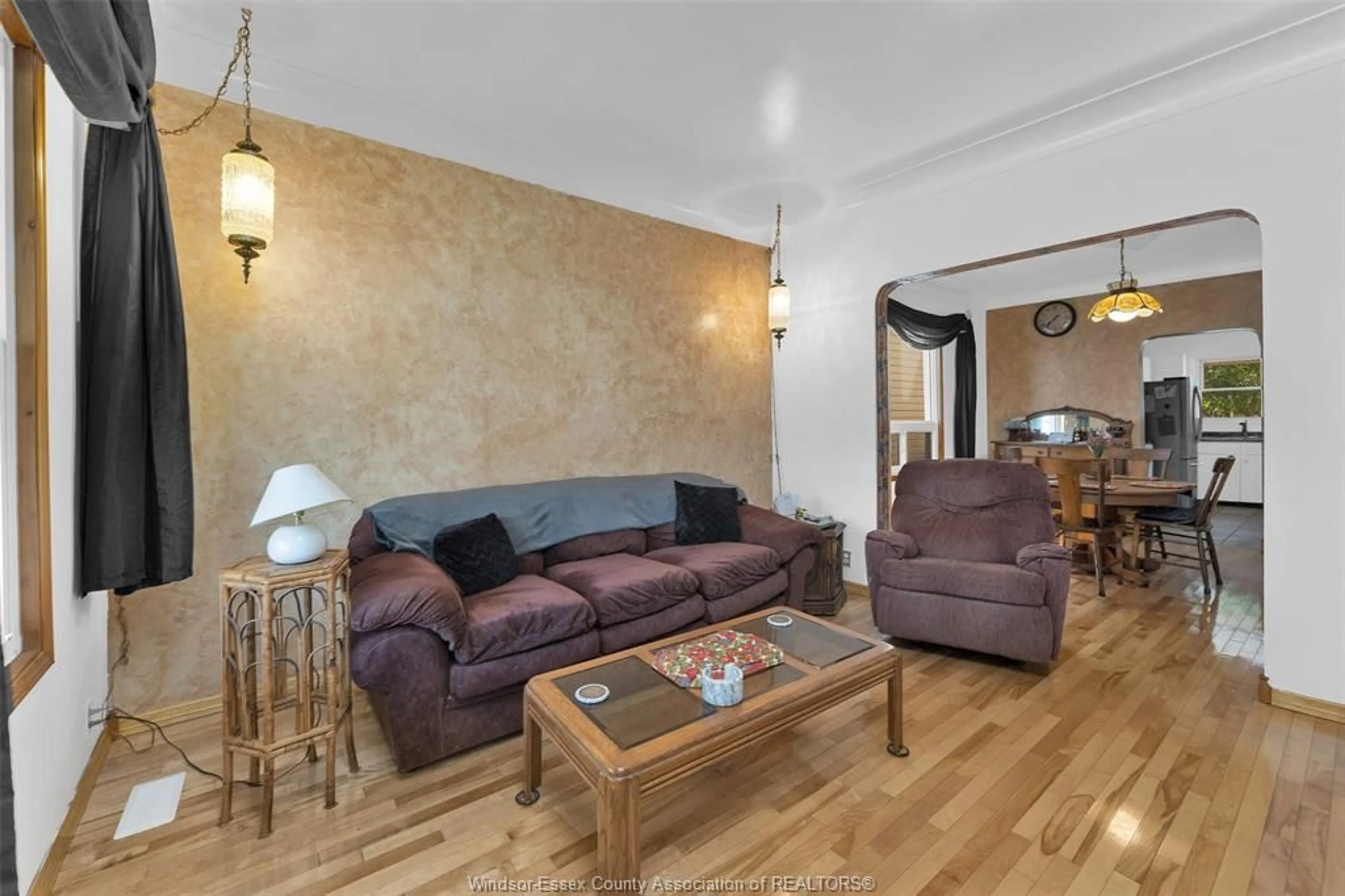 Living room with furniture, wood/laminate floor for 369 PIERRE Ave, Windsor Ontario N9A 2J7