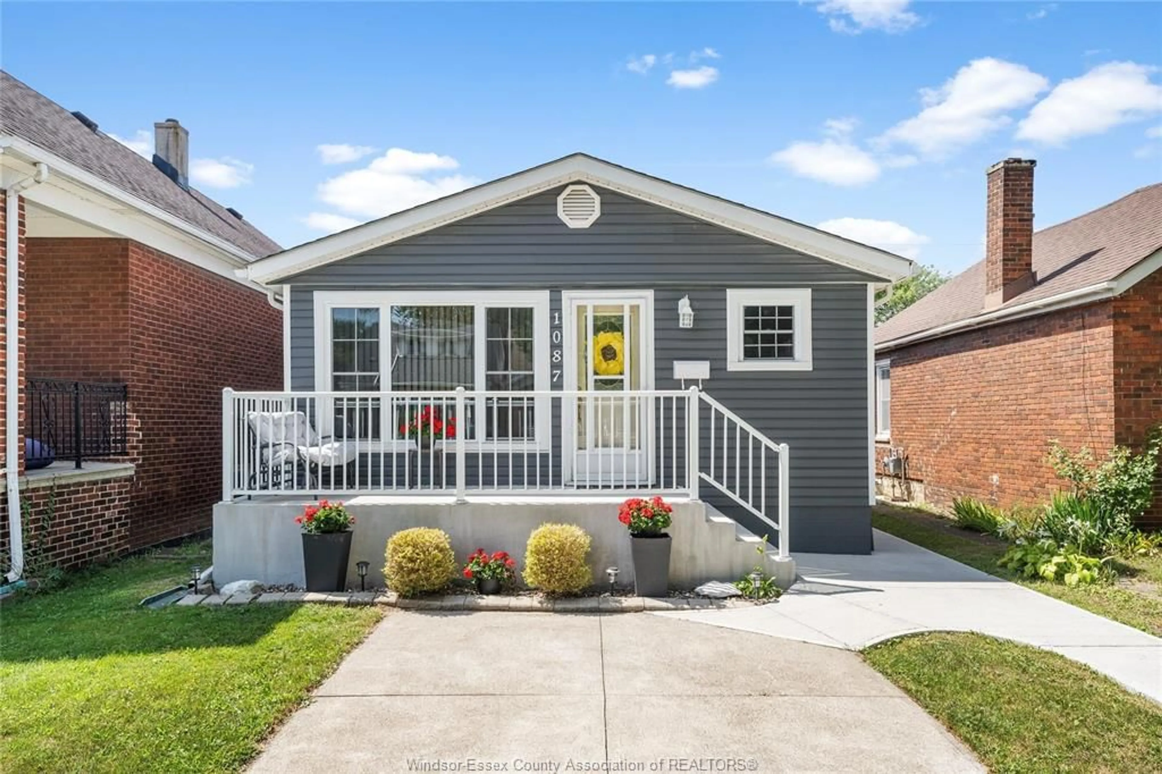 Home with vinyl exterior material, street for 1087 CAMPBELL Ave, Windsor Ontario N9B 2J4