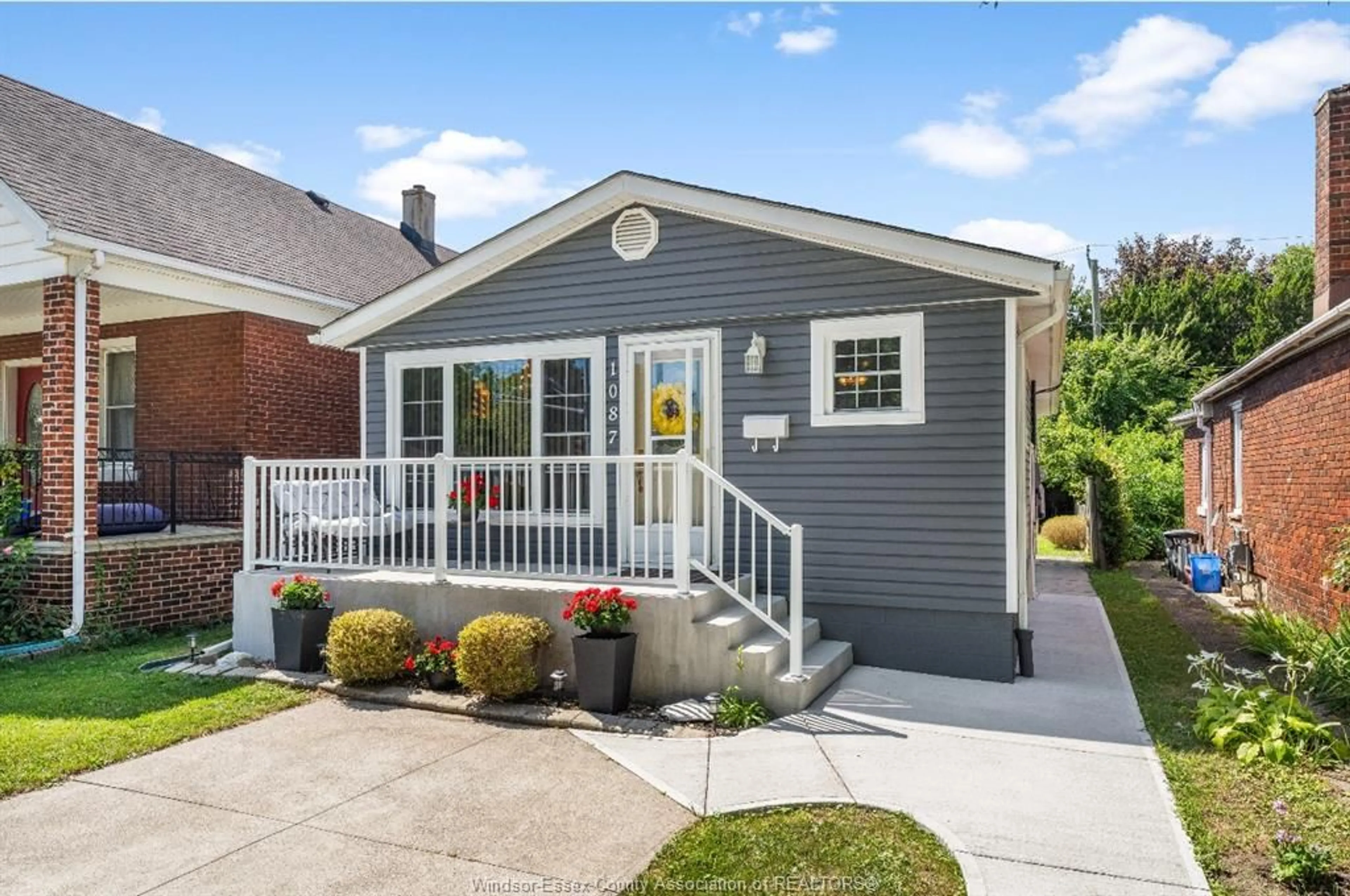 Home with vinyl exterior material, street for 1087 CAMPBELL Ave, Windsor Ontario N9B 2J4