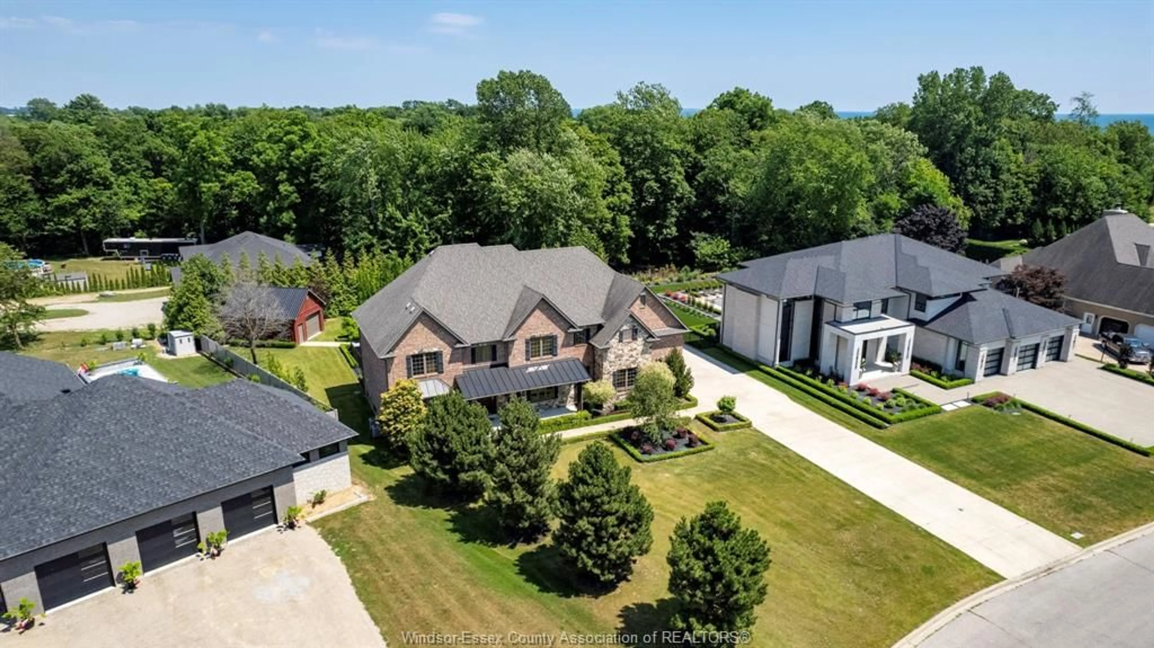 A pic from outside/outdoor area/front of a property/back of a property/a pic from drone, street for 3 DIMENNA Dr, Kingsville Ontario N9Y 4C7