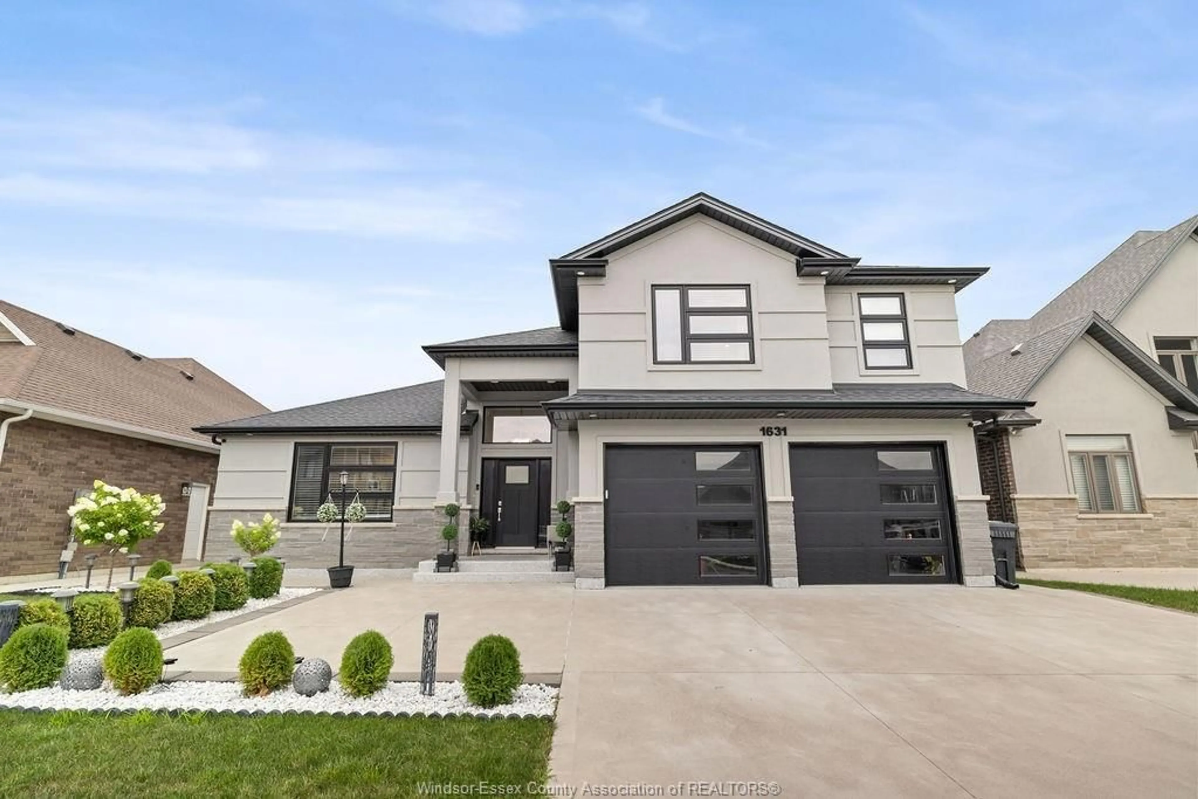 Home with vinyl exterior material, street for 1631 CLEARWATER Ave, Windsor Ontario N8P 0E9