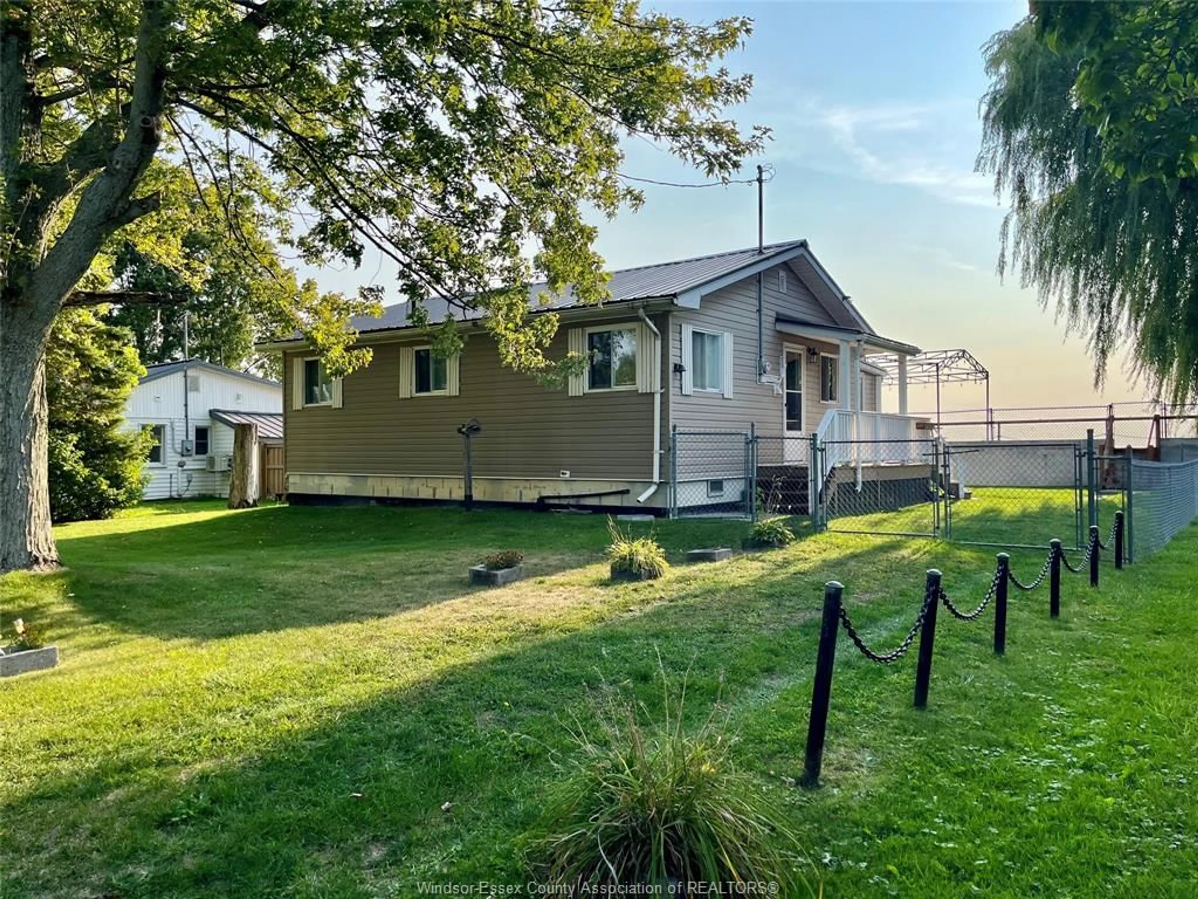 A pic from outside/outdoor area/front of a property/back of a property/a pic from drone, street for 156 LAKESHORE, Leamington Ontario N0P 2P0
