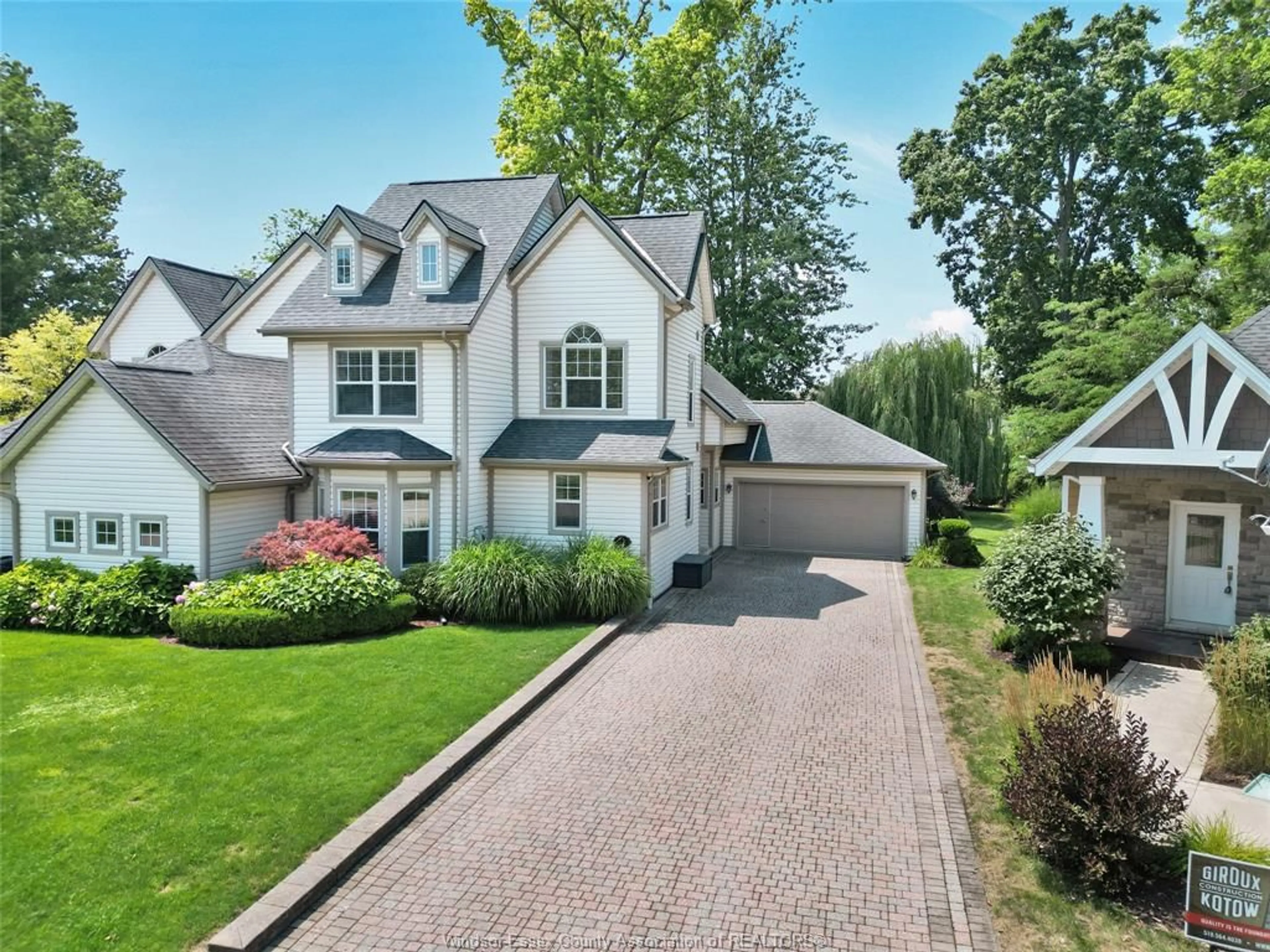 Home with brick exterior material, street for 71 RED OAK Cres, Amherstburg Ontario N9V 4C4