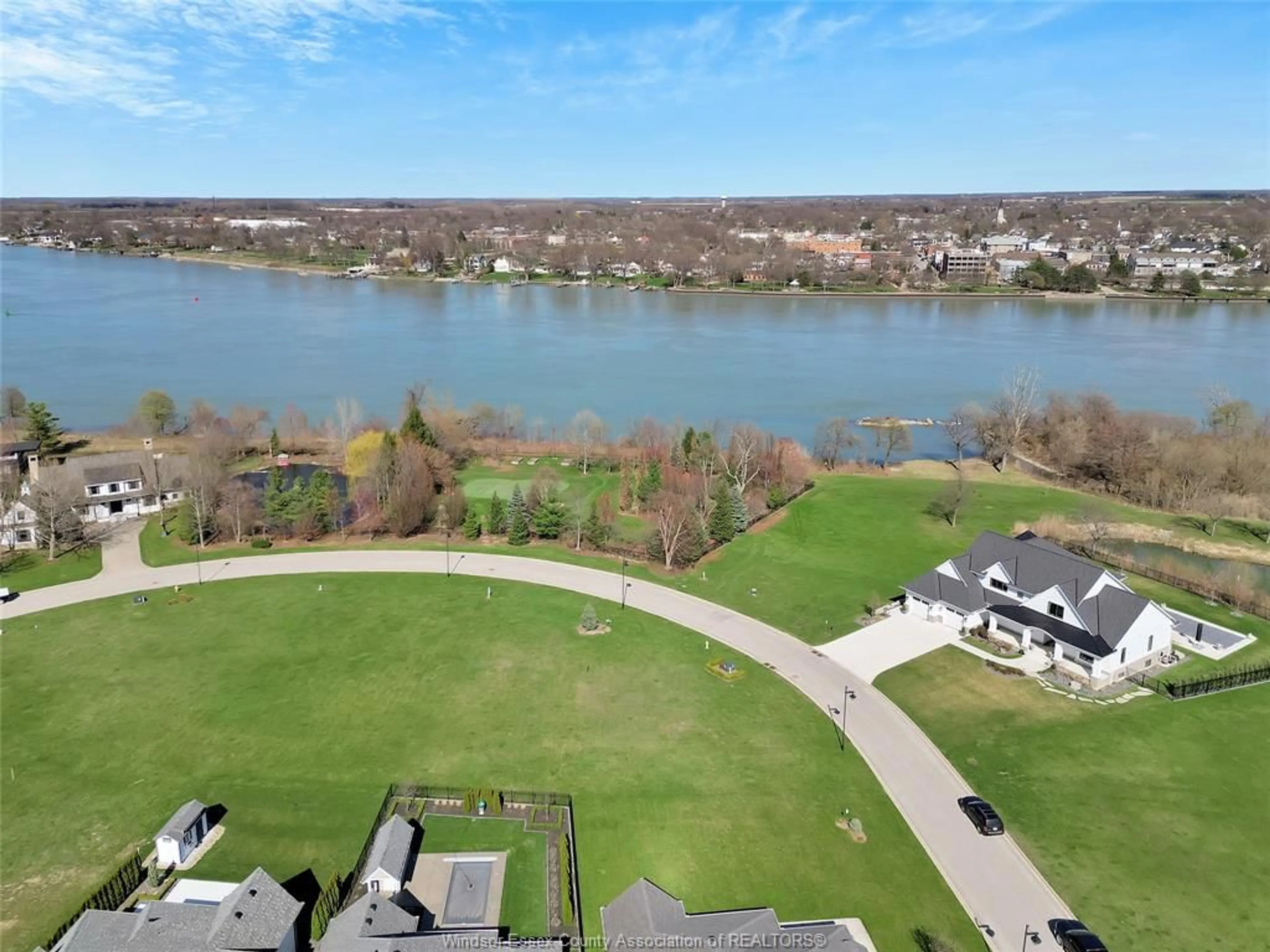 A pic from outside/outdoor area/front of a property/back of a property/a pic from drone, water/lake/river/ocean view for 104 RIVERWALK Cres, Amherstburg Ontario N9V 4C4