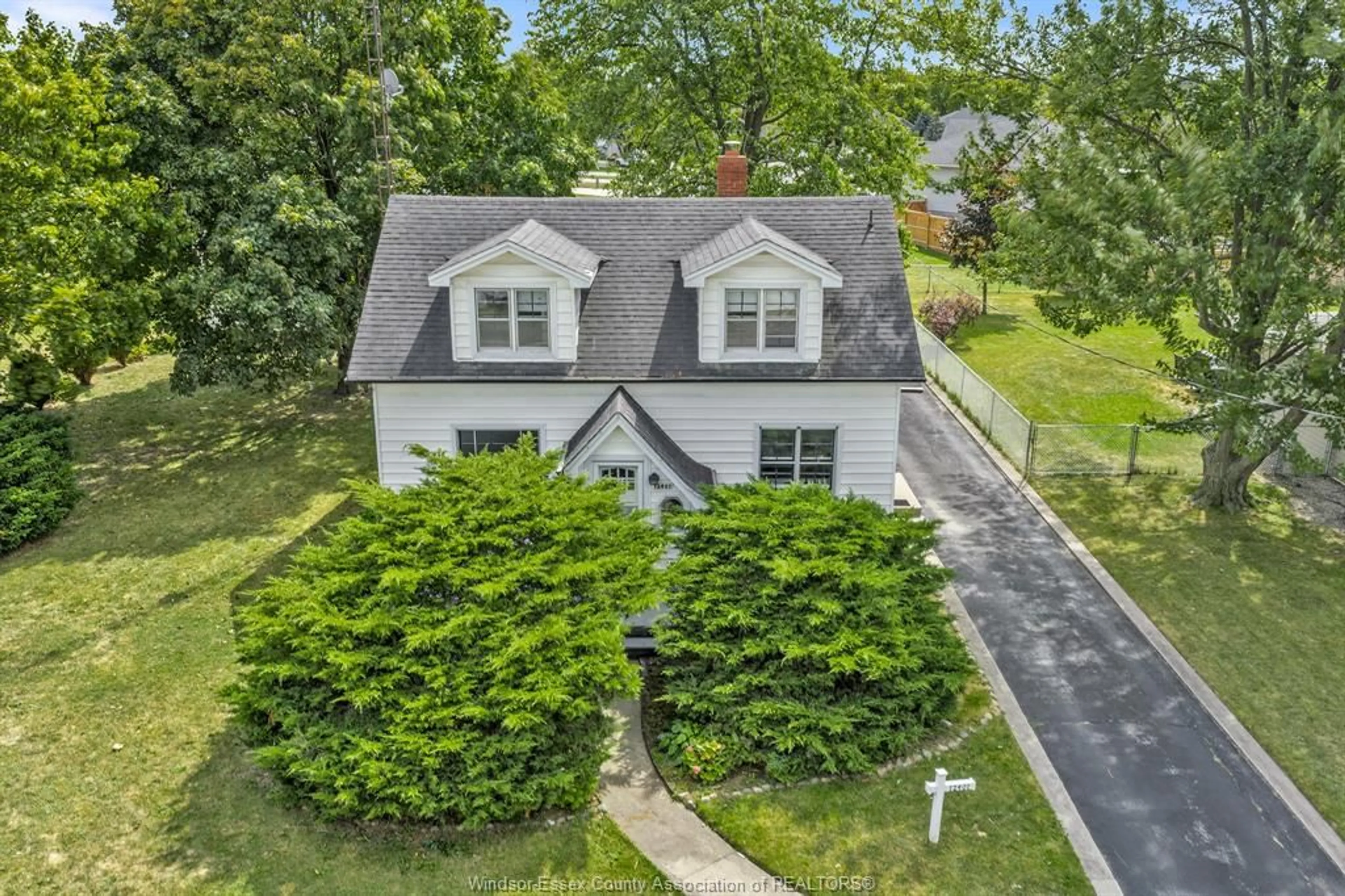 A pic from outside/outdoor area/front of a property/back of a property/a pic from drone, street for 12401 RENAUD St, Tecumseh Ontario N8N 1P5