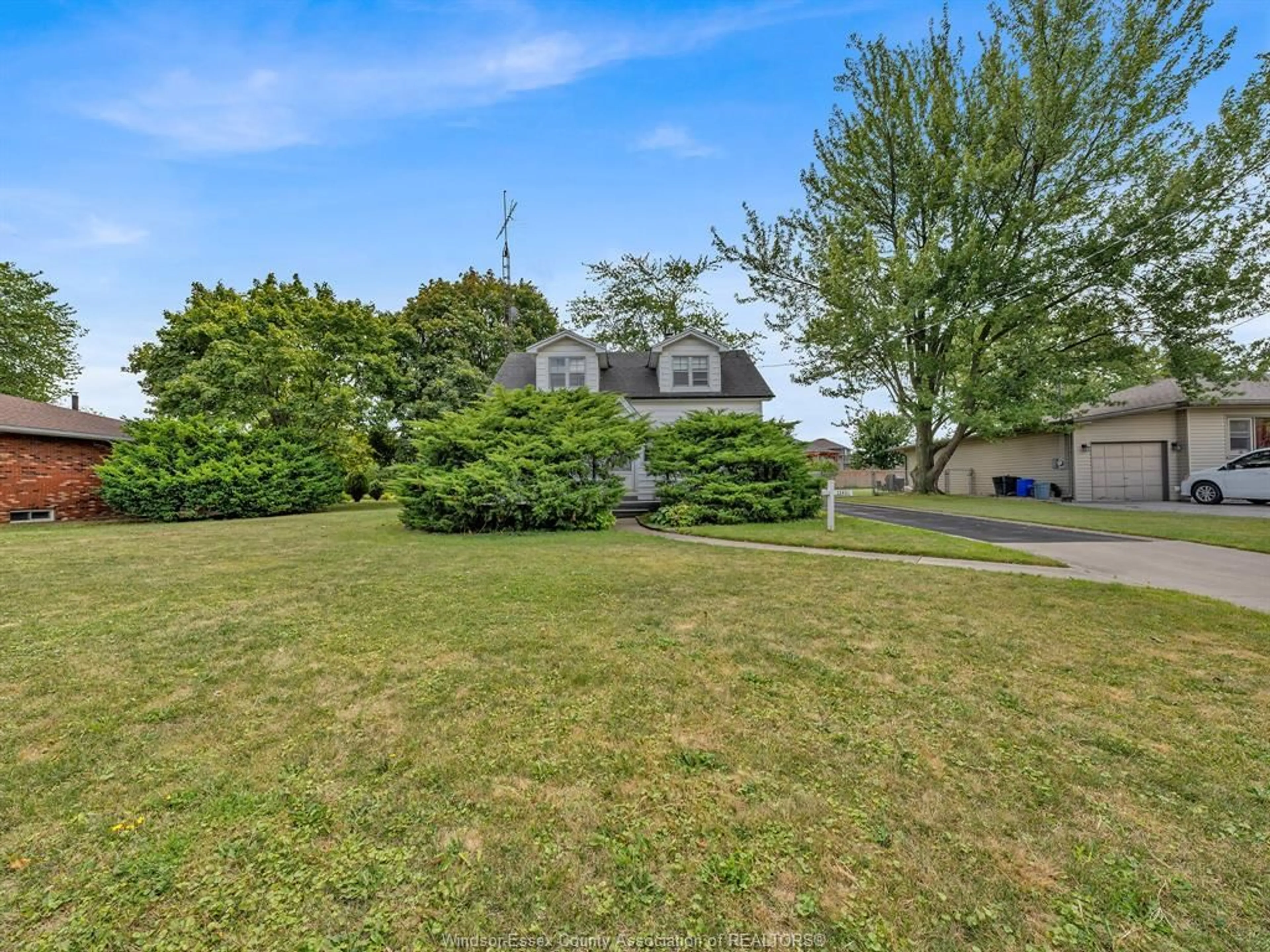 A pic from outside/outdoor area/front of a property/back of a property/a pic from drone, water/lake/river/ocean view for 12401 RENAUD St, Tecumseh Ontario N8N 1P5