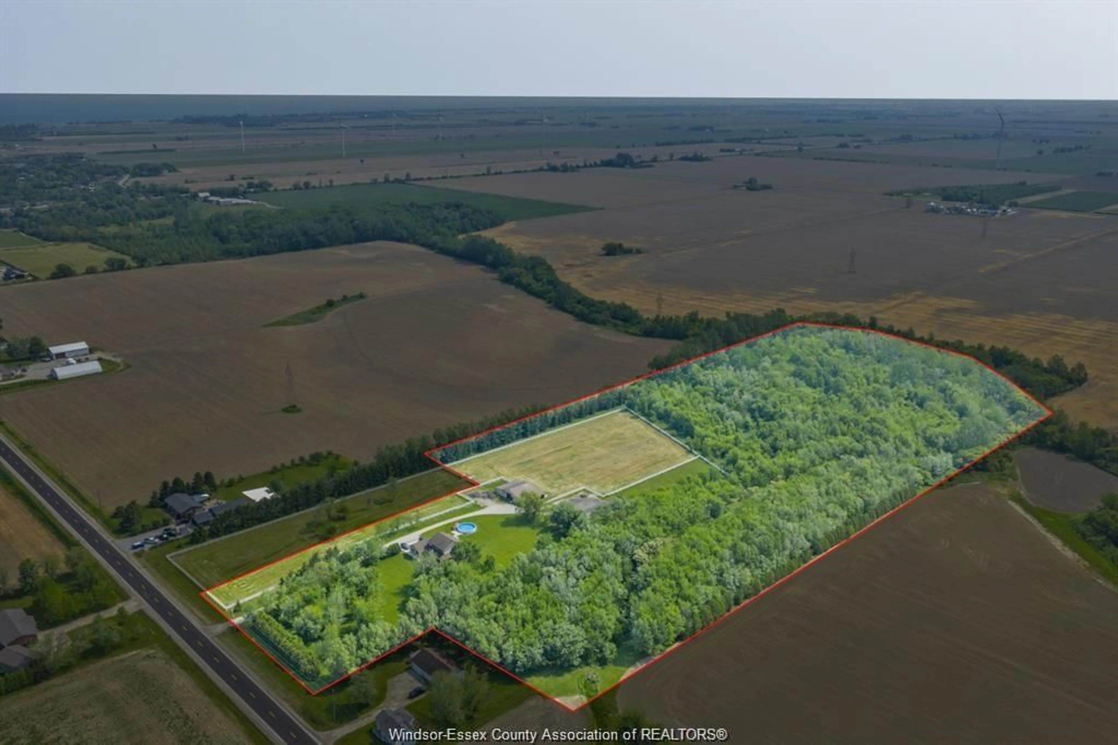 A pic from outside/outdoor area/front of a property/back of a property/a pic from drone, forest/trees view for 1418 COUNTY RD 31, Lakeshore Ontario N0R 1S0