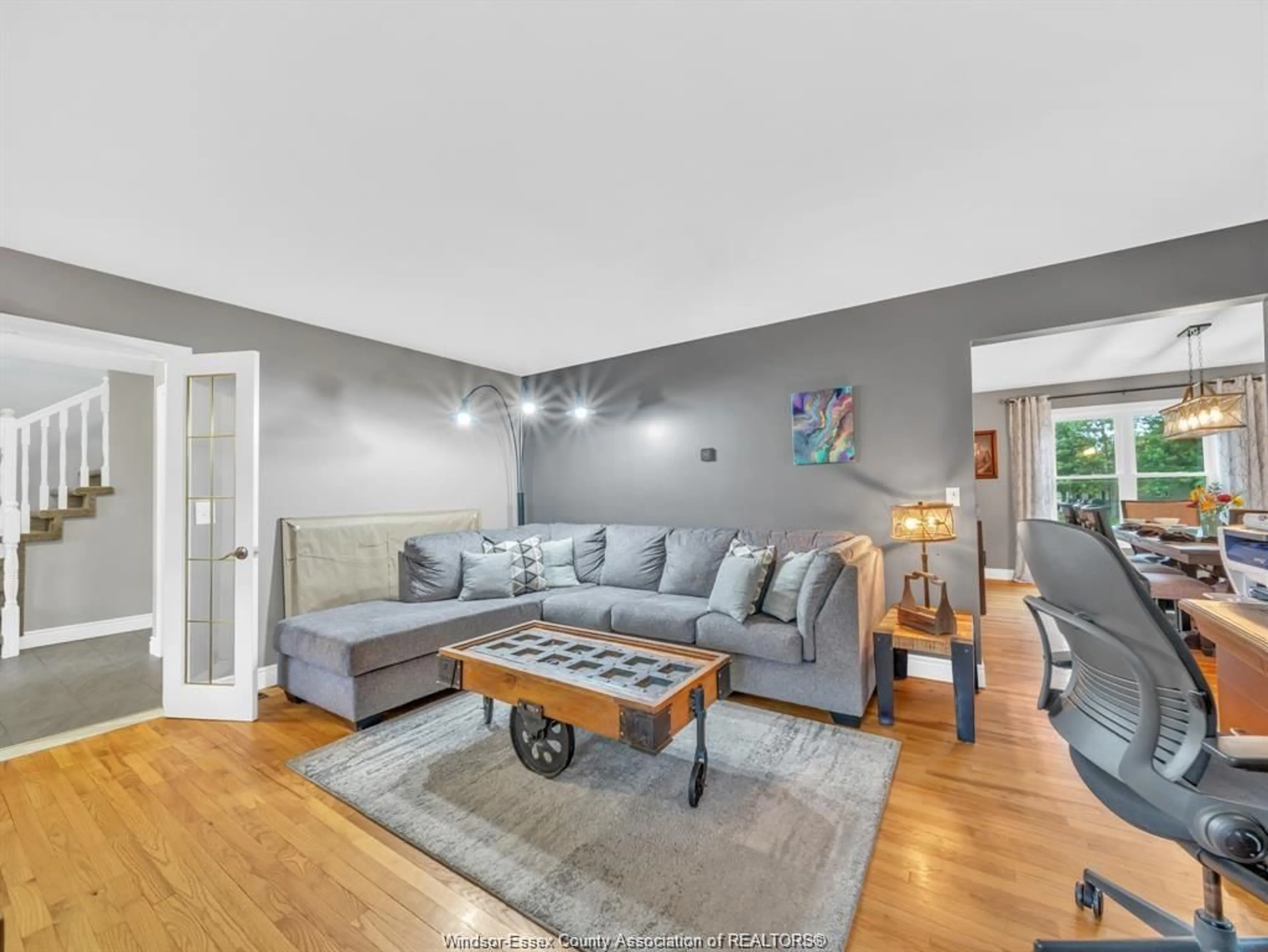 Living room with furniture, wood/laminate floor for 1418 COUNTY RD 31, Lakeshore Ontario N0R 1S0