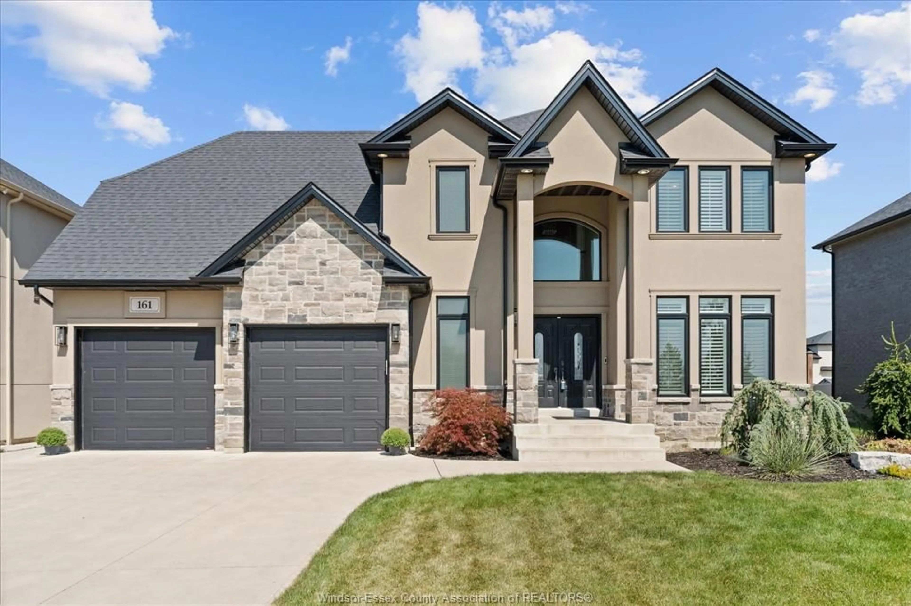 Home with brick exterior material, street for 161 Summer, Belle River Ontario N0R 1A0