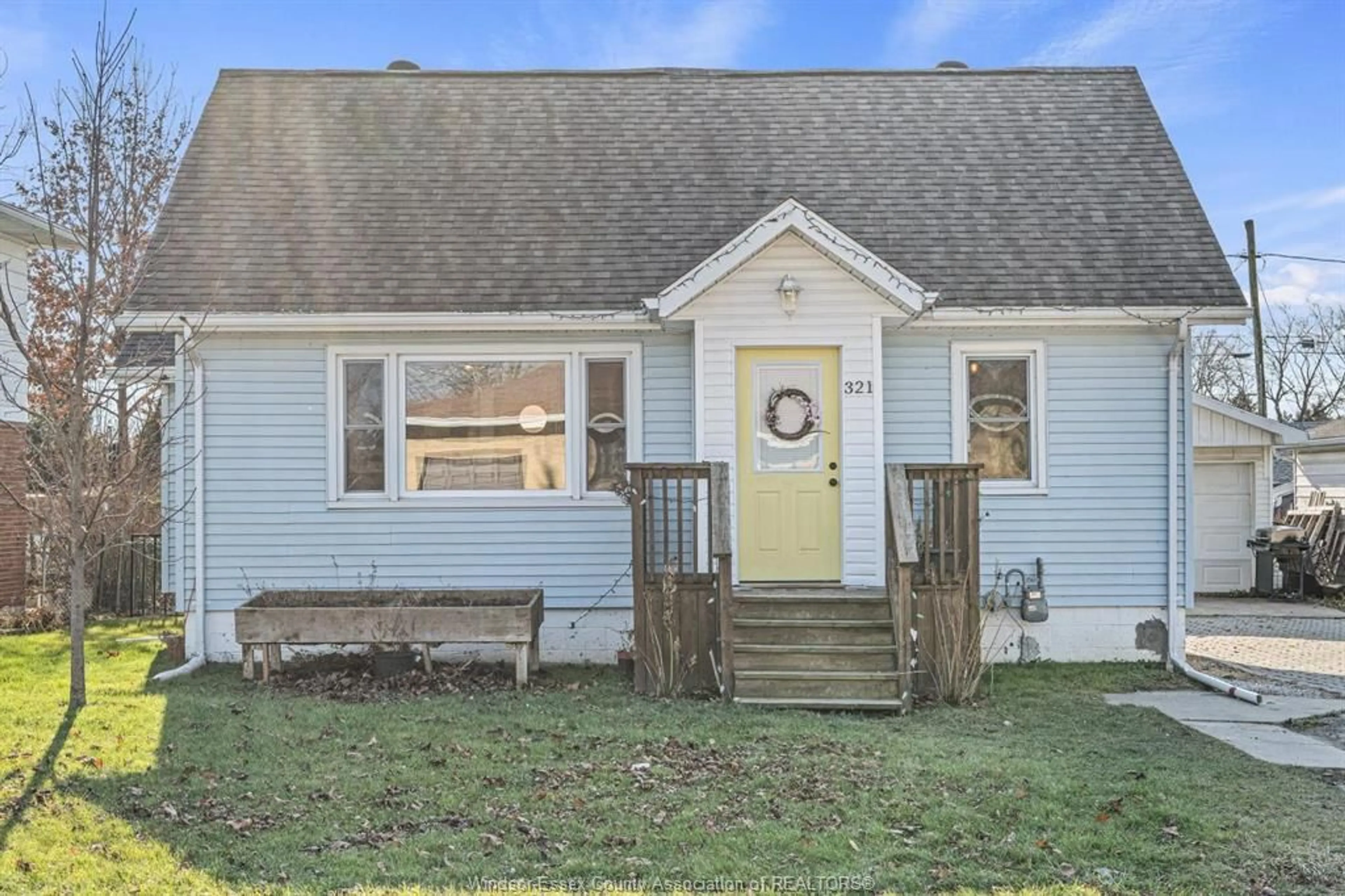 Home with vinyl exterior material, street for 321 SINASAC St, Harrow Ontario N0R 1G0