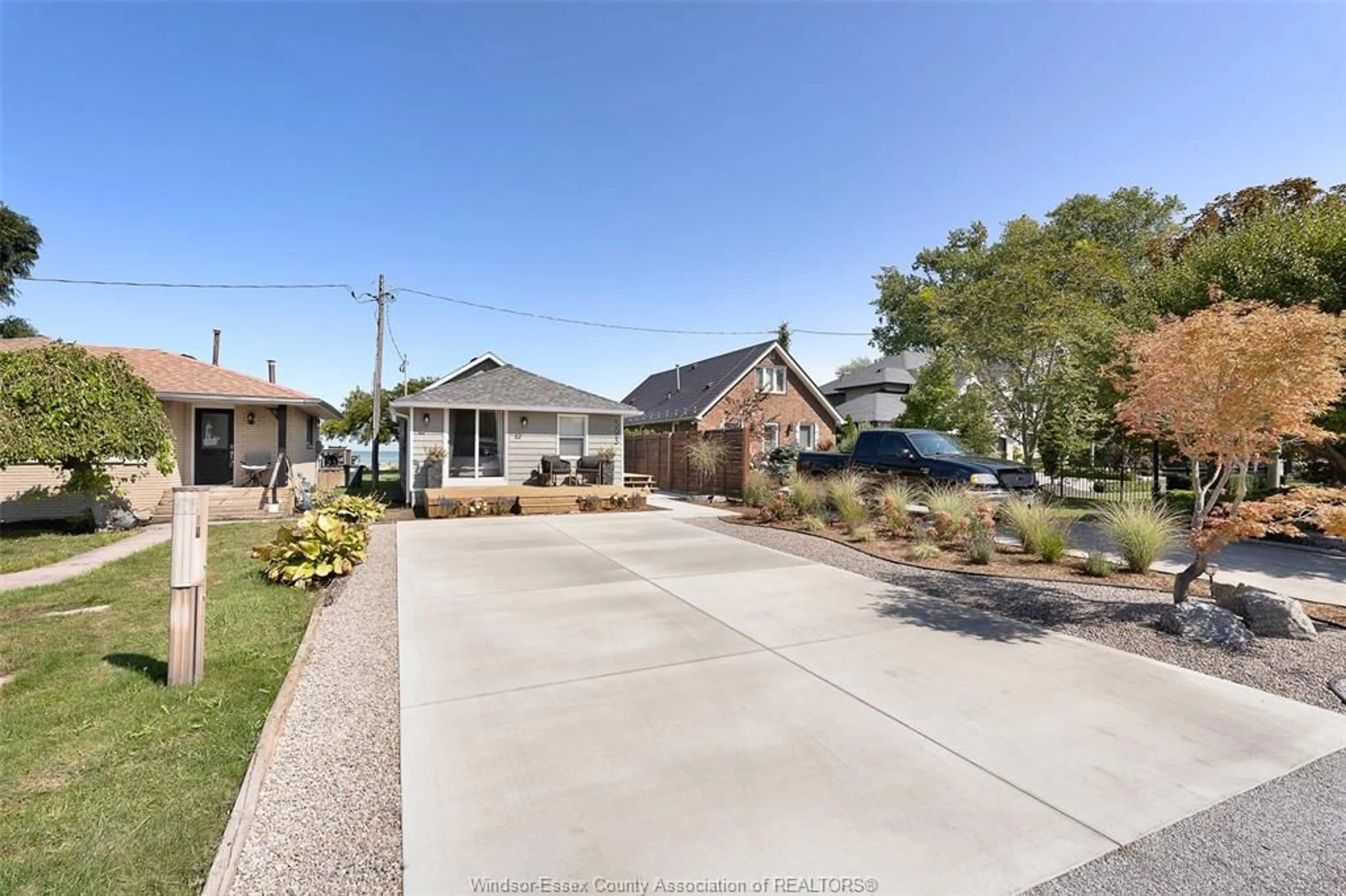 A pic from outside/outdoor area/front of a property/back of a property/a pic from drone, street for 593 ROSS BEACH RD, Lakeshore Ontario N0R 1A0