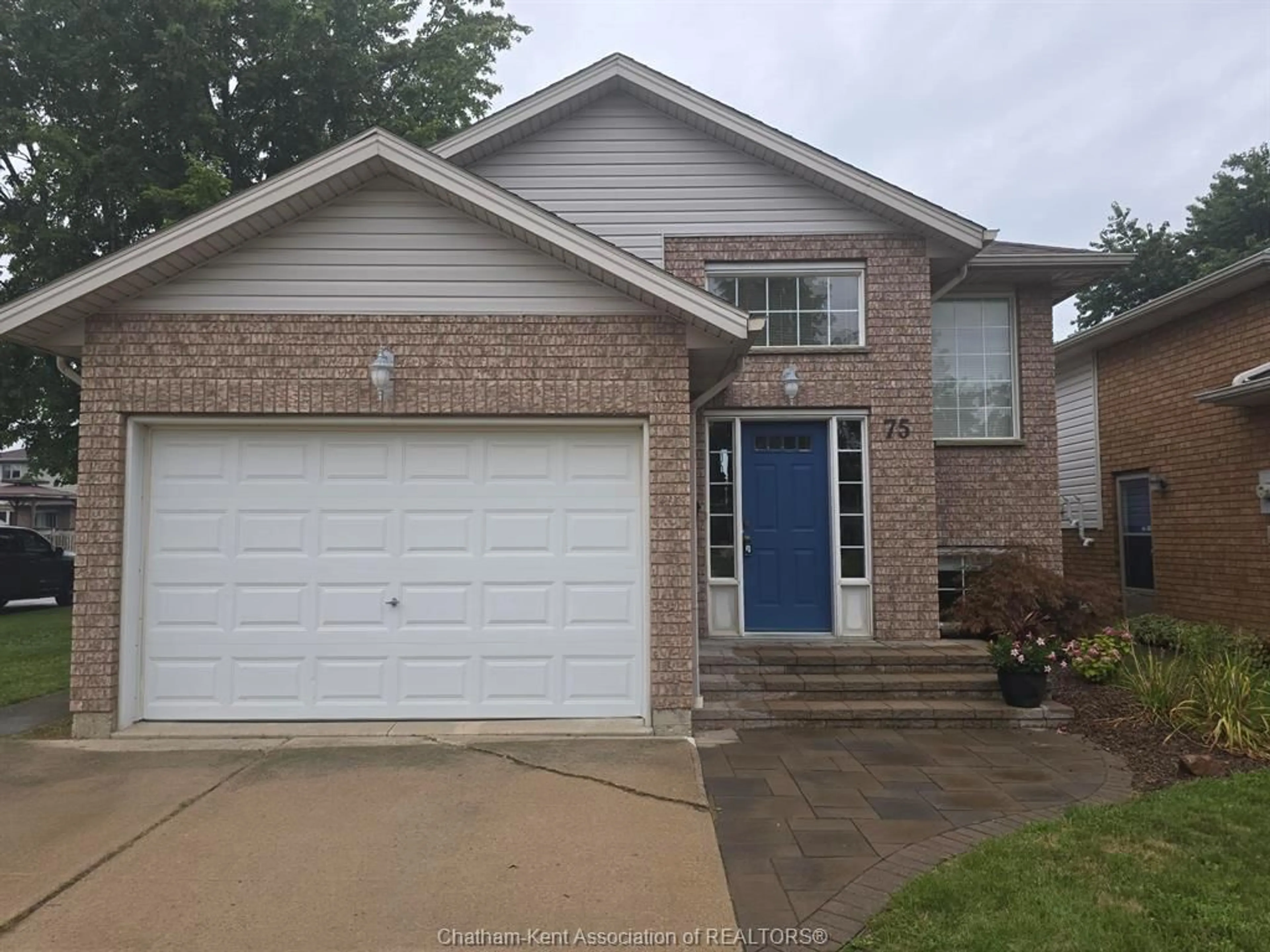 Home with brick exterior material, street for 75 Taylor Trail, Chatham Ontario N7L 5N2