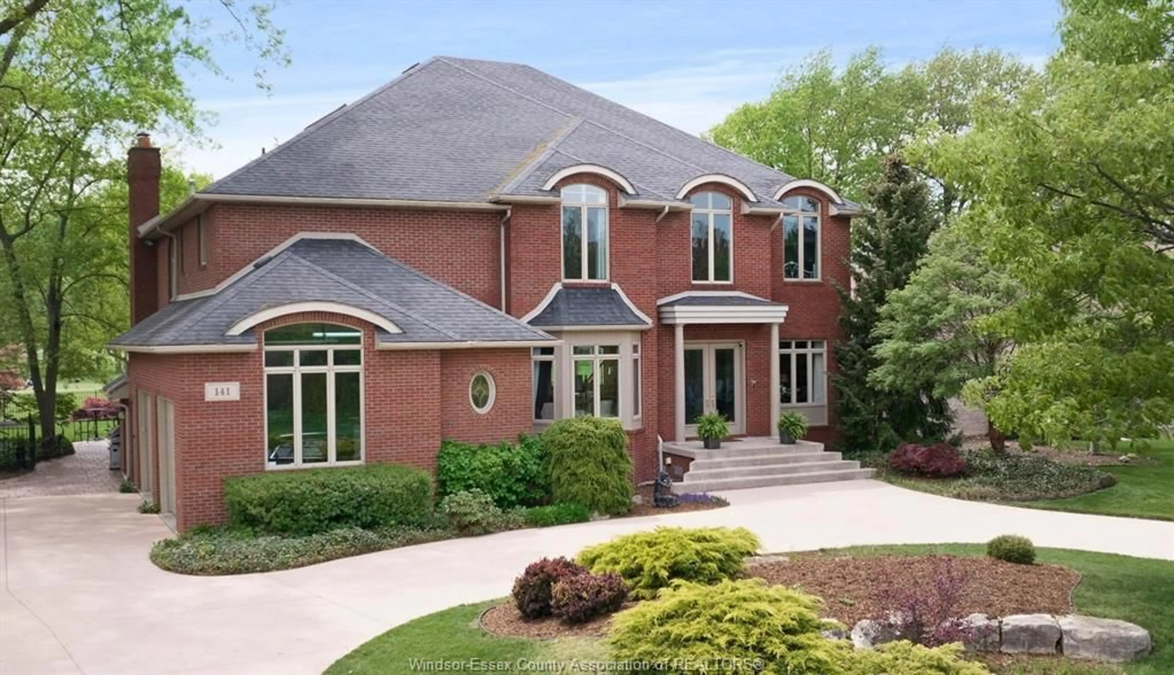 Home with brick exterior material, street for 141 CLUBVIEW Dr, Amherstburg Ontario N9V 3Z2