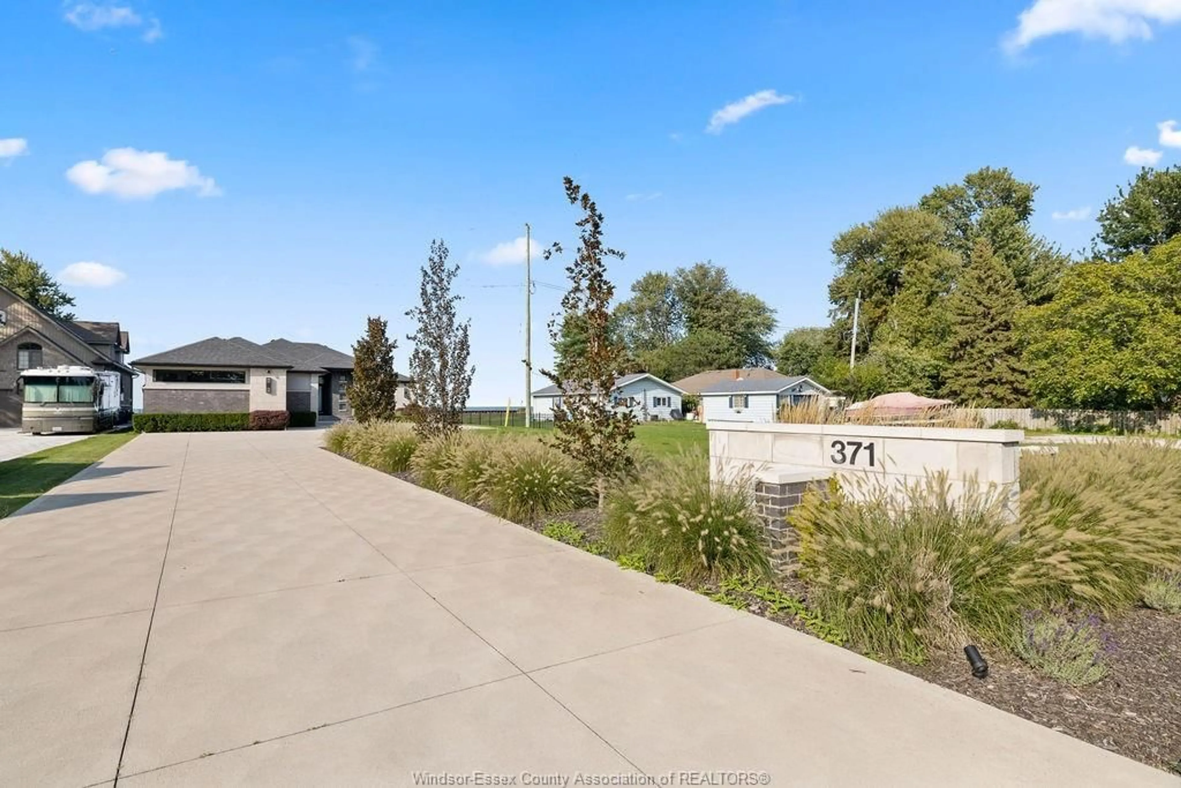 A pic from outside/outdoor area/front of a property/back of a property/a pic from drone, water/lake/river/ocean view for 371 CHARRON BEACH, Lakeshore Ontario N8L 0G2